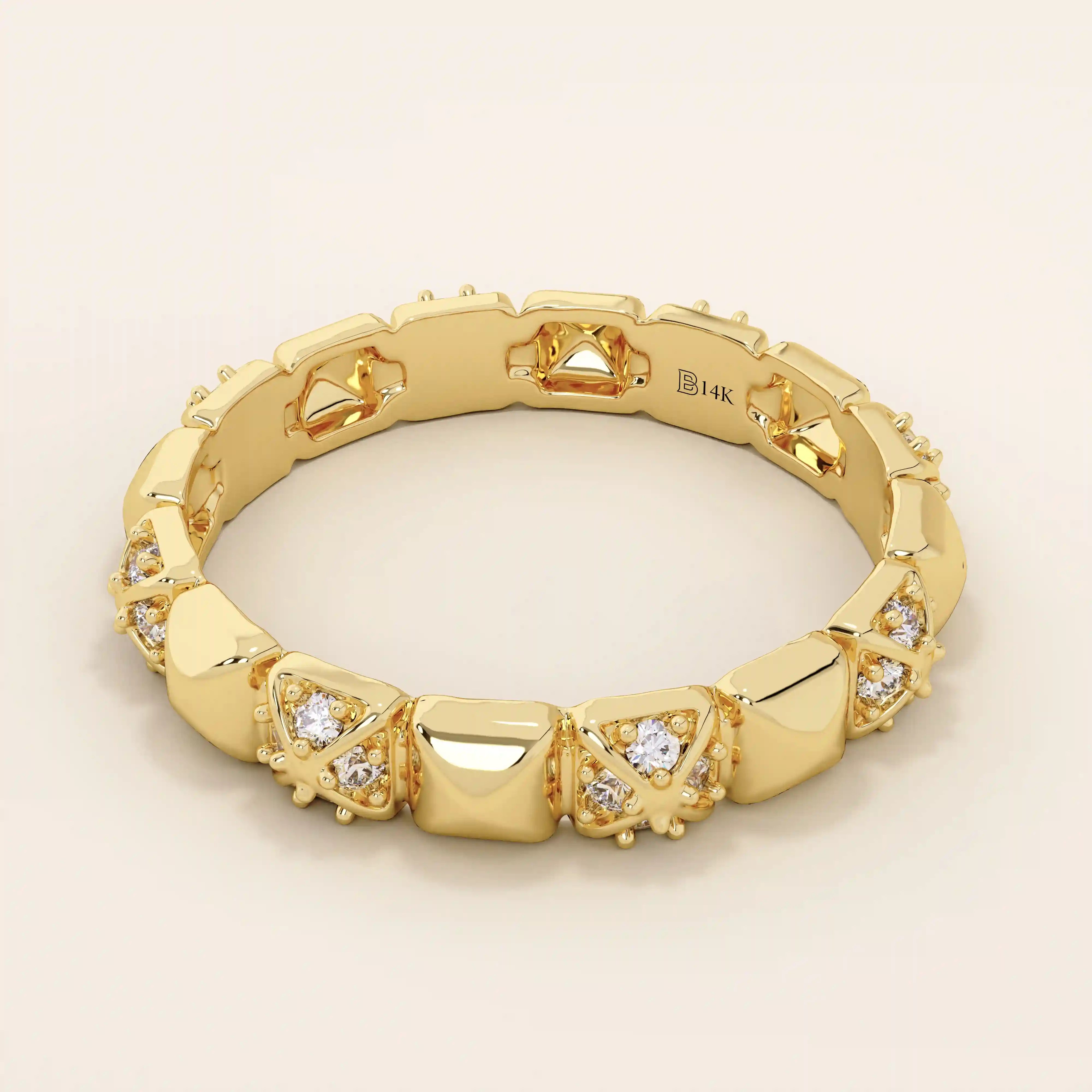 14k solid gold wedding band with pyramid-like angles and pave moissanite detailing. A bold yet refined geometric ring. Perfect as a modern wedding or stacking band.