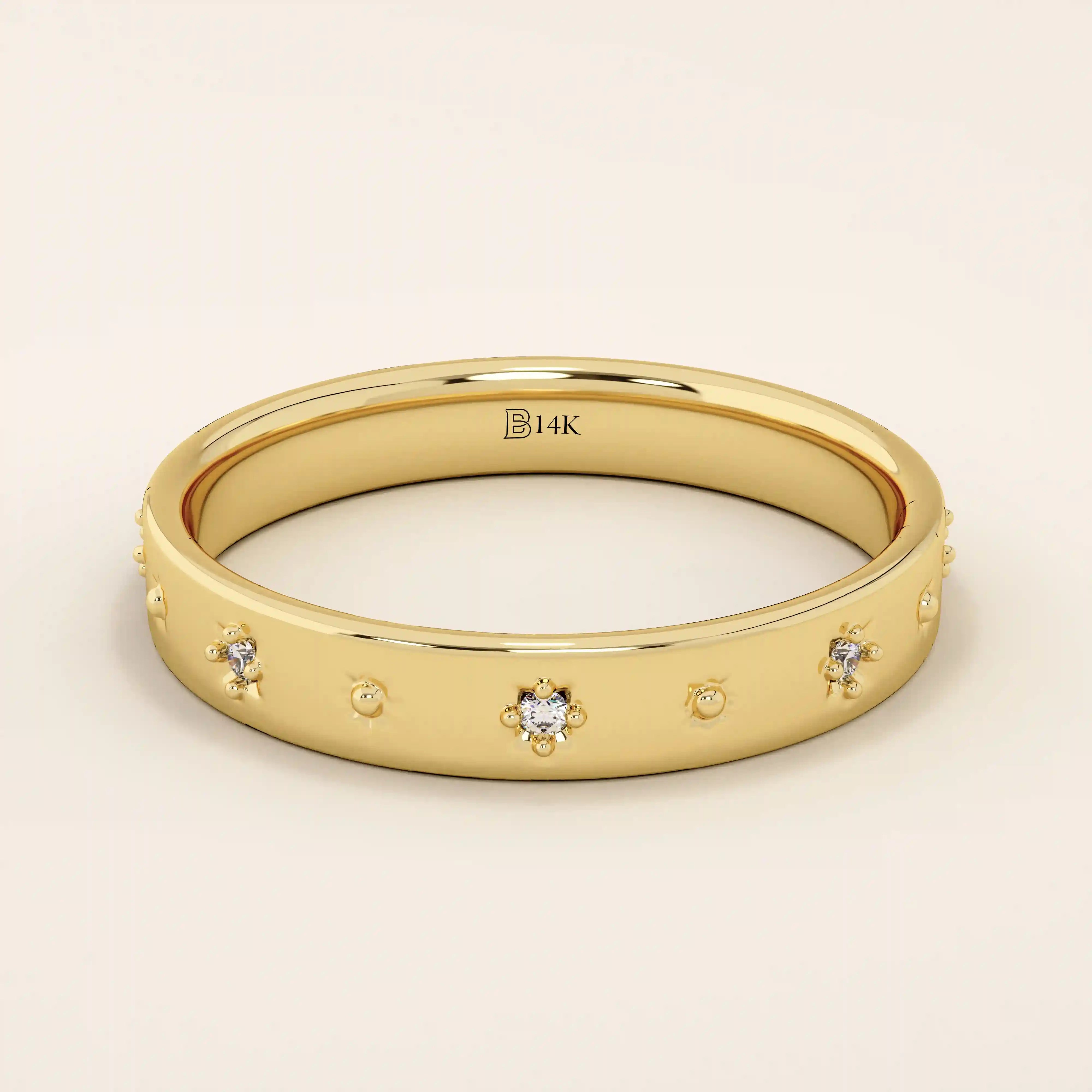 14k solid yellow gold wedding band adorned with tiny celestial star motifs, each featuring a delicate round moissanite at its center, evenly spaced around the polished band for a minimalist yet enchanting design.