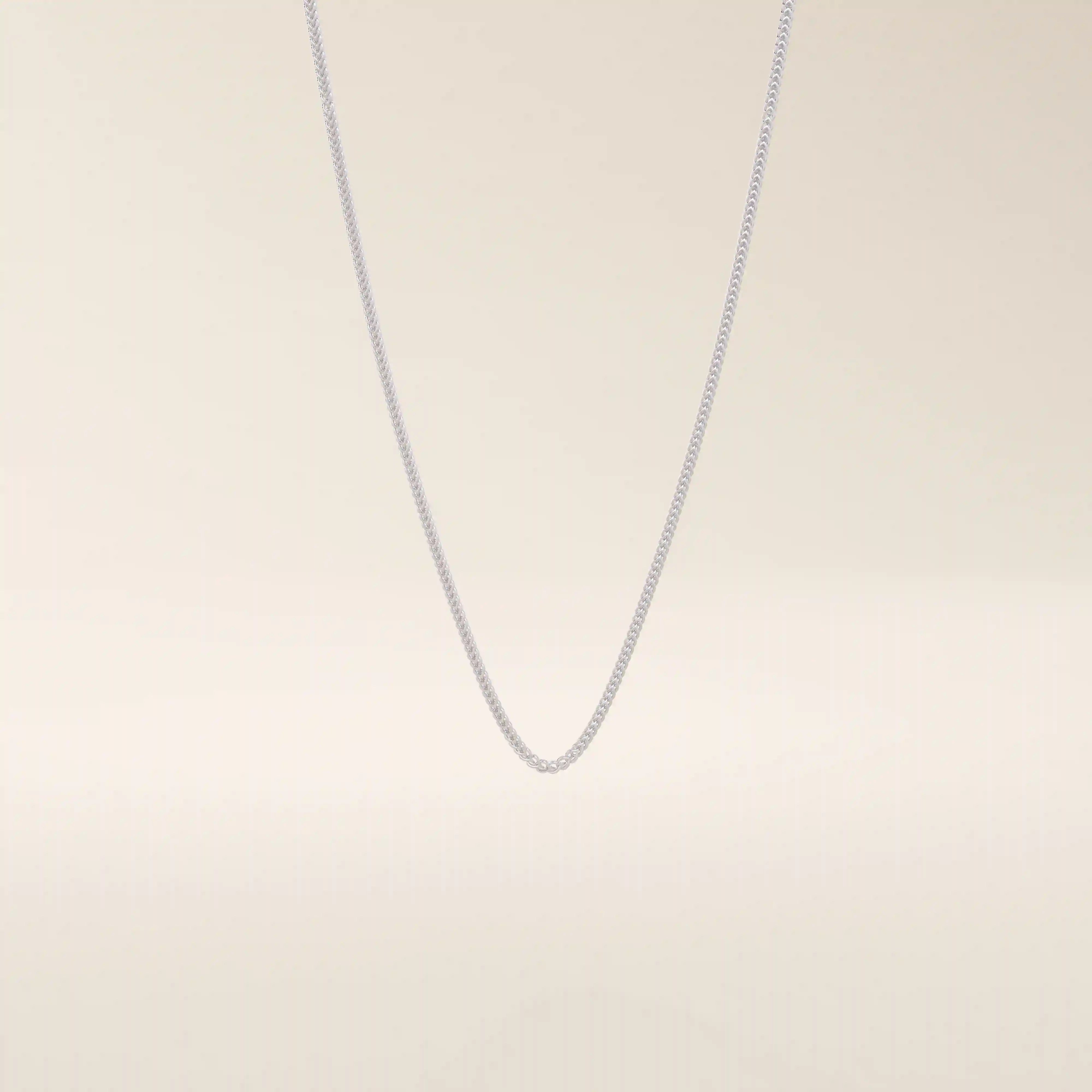 14k solid gold wheat chain necklace with a smooth, tightly woven texture. A classic gold chain with timeless appeal. Ideal for daily wear or layering.