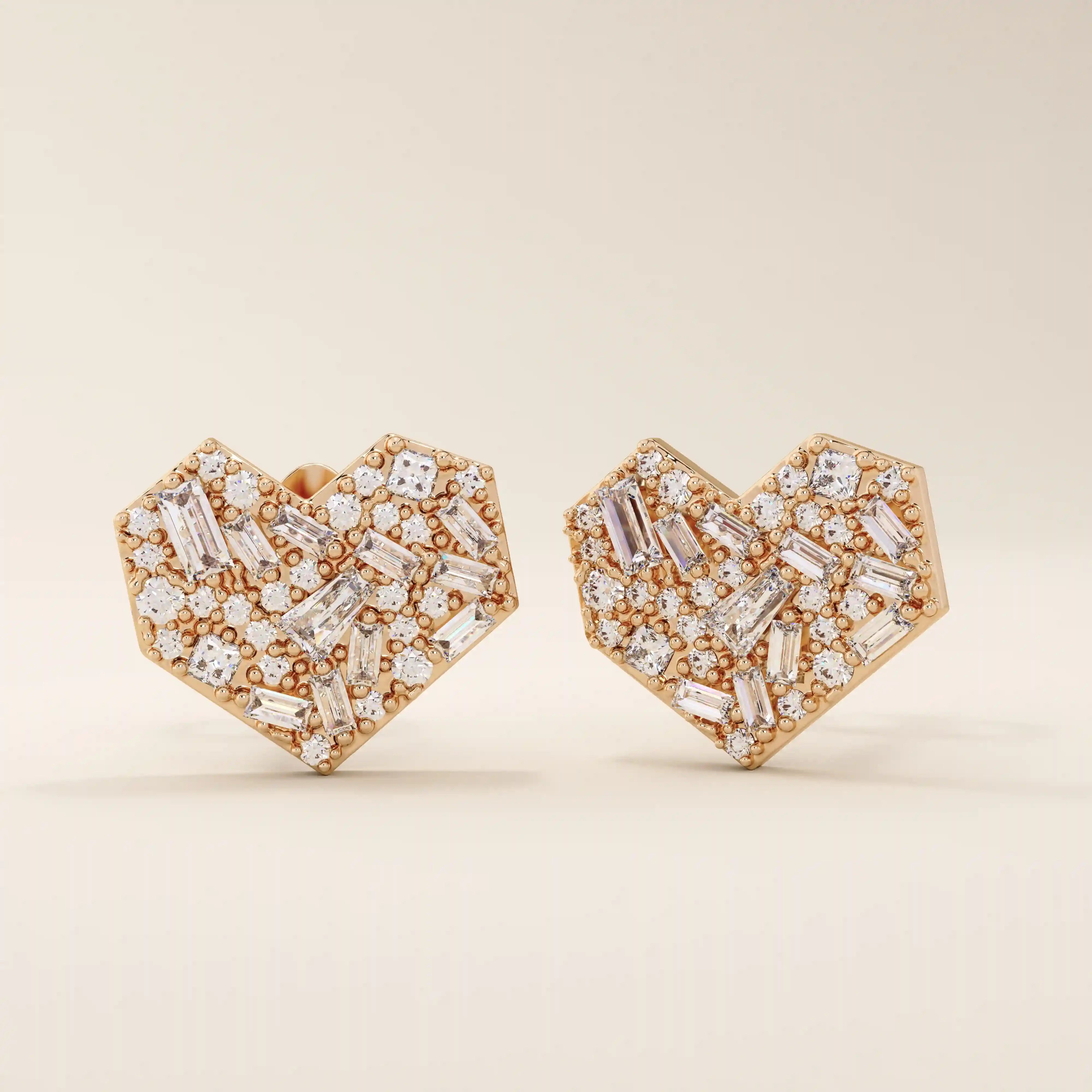 14k solid rose gold heart-shaped stud earrings pavé-set with a mix of baguette and round white moissanite stones, offering a romantic and modern style.