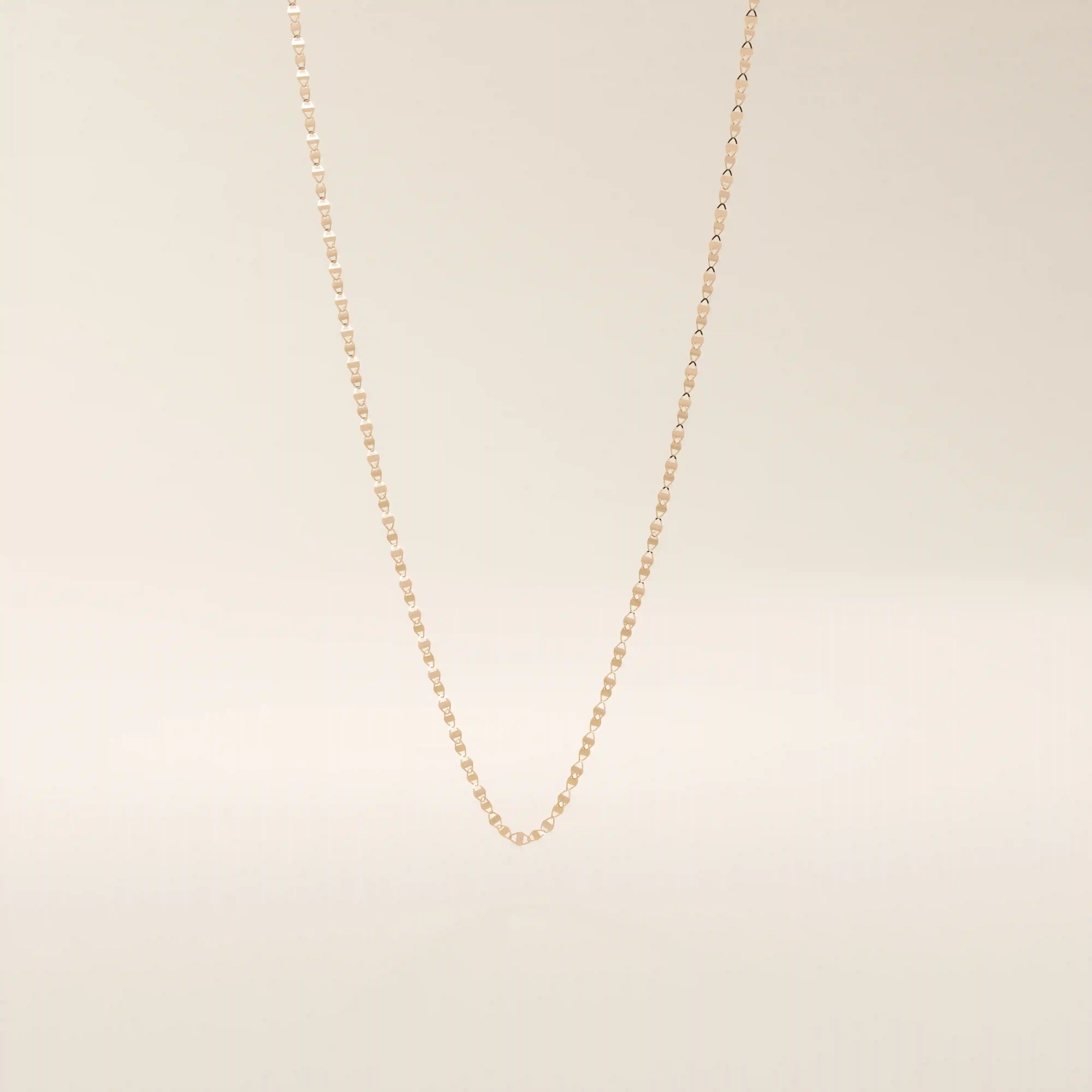 14k solid rose gold mariner chain necklace showcasing the signature flat bar-inset links, blending warm tones with timeless nautical elegance.