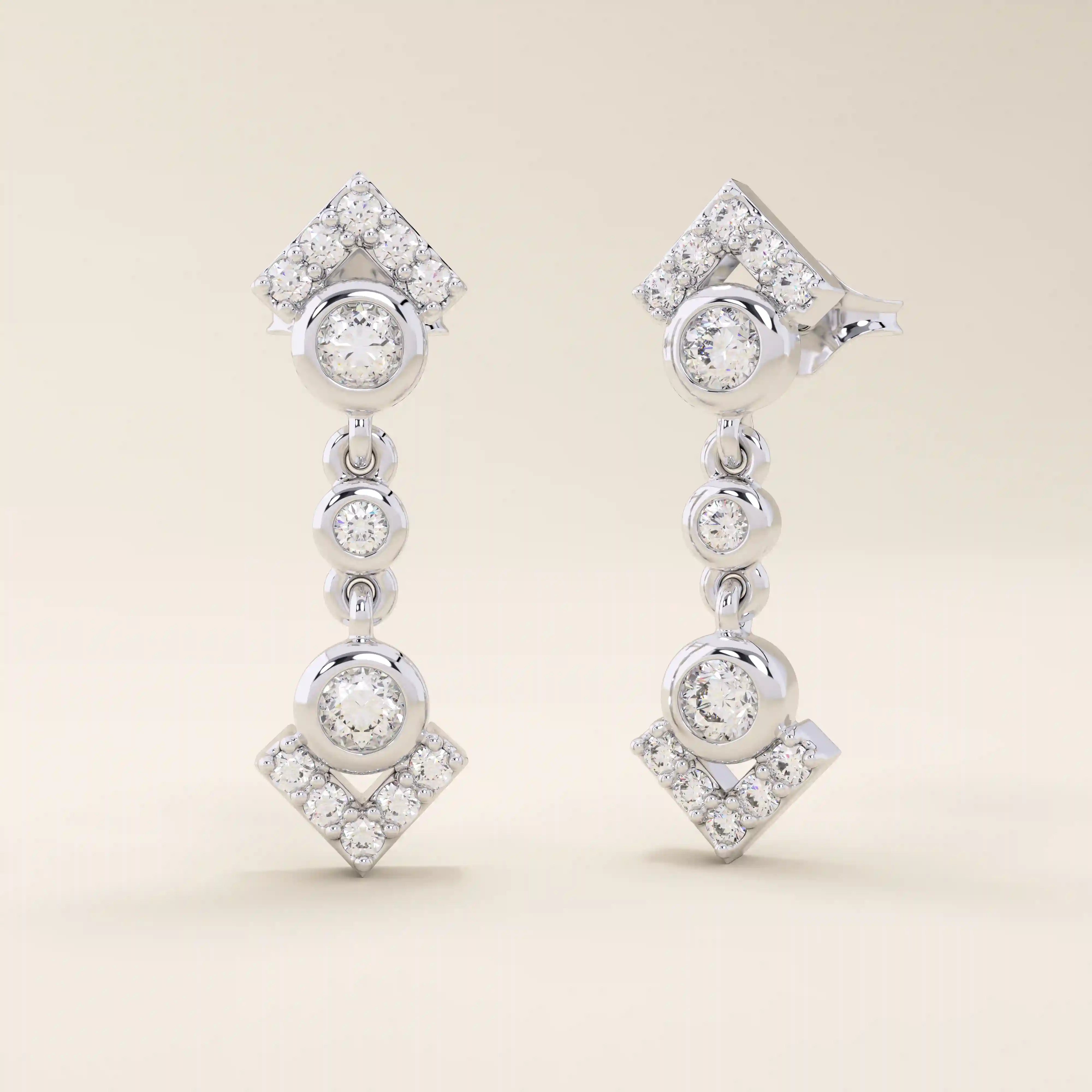 14k solid white gold arrow-inspired drop stud earrings with bezel-set moissanites and pavé-set diamond-shaped tips.