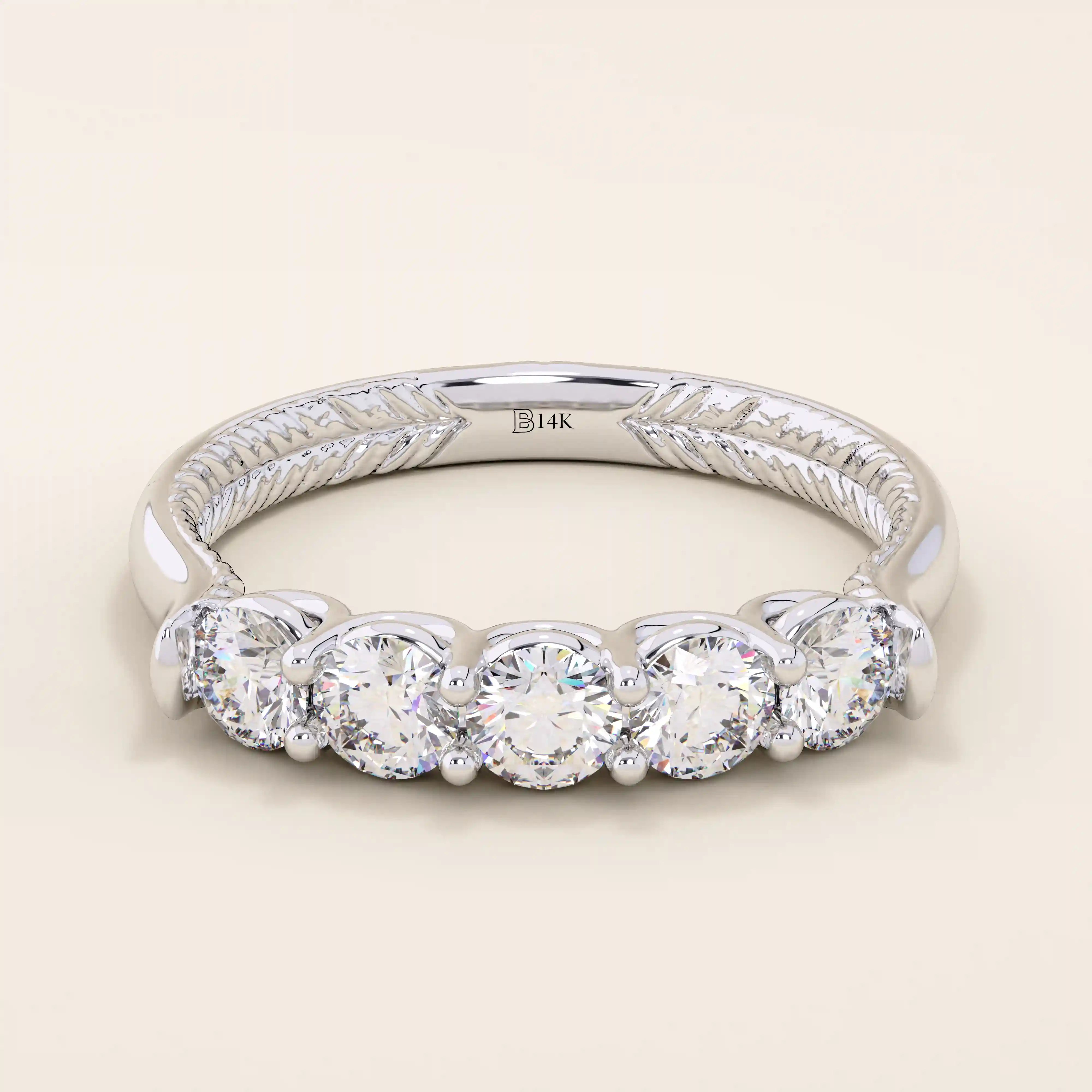 14k solid white gold band with five round brilliant cut moissanite stones in a traditional prong setting and engraved shank detail, elegant wedding or anniversary ring