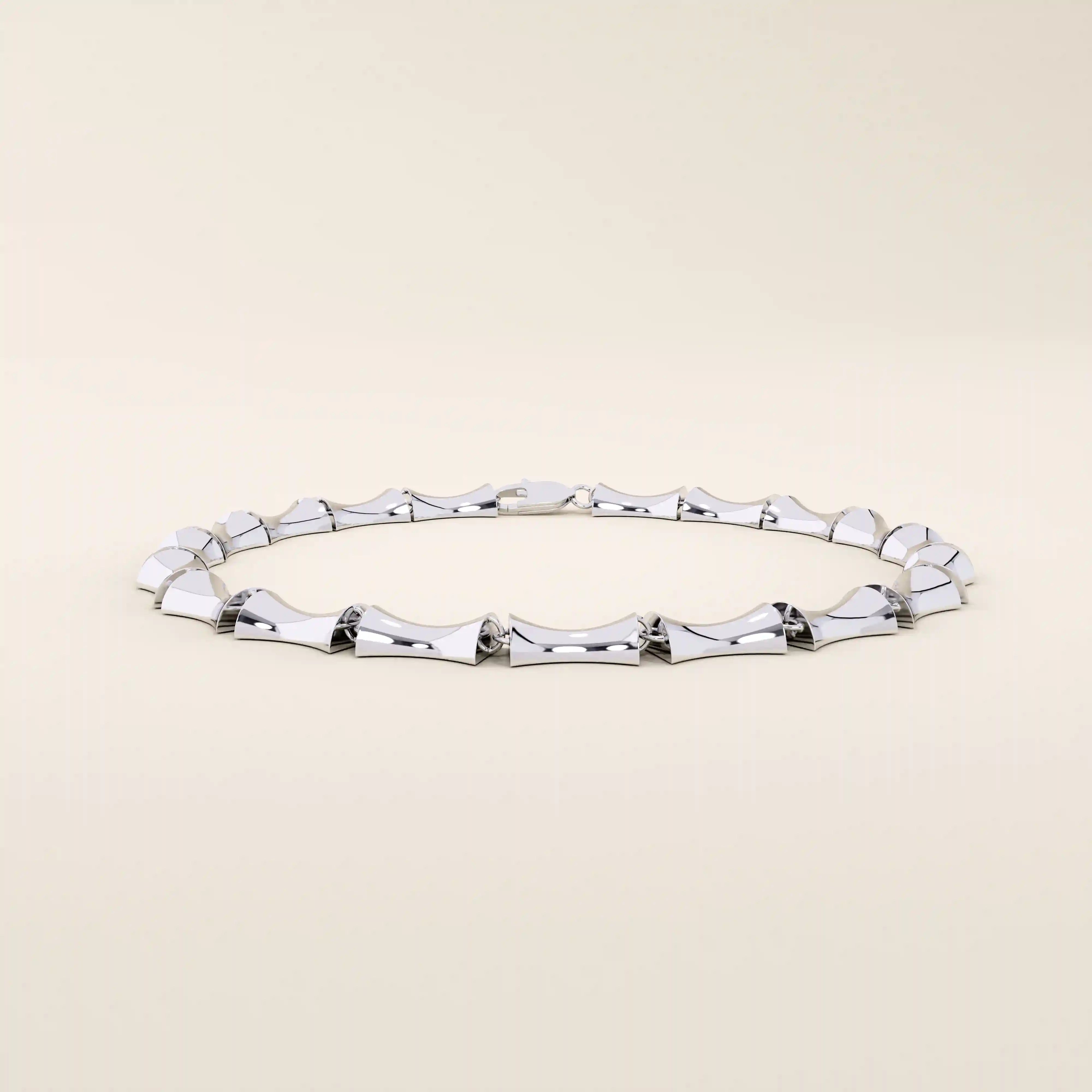 14k solid white gold bone bracelet crafted with bold, curved links in a smooth high-shine finish.