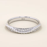 14k solid white gold braided wedding band featuring a row of round brilliant diamonds, minimalist and timeless fine jewelry