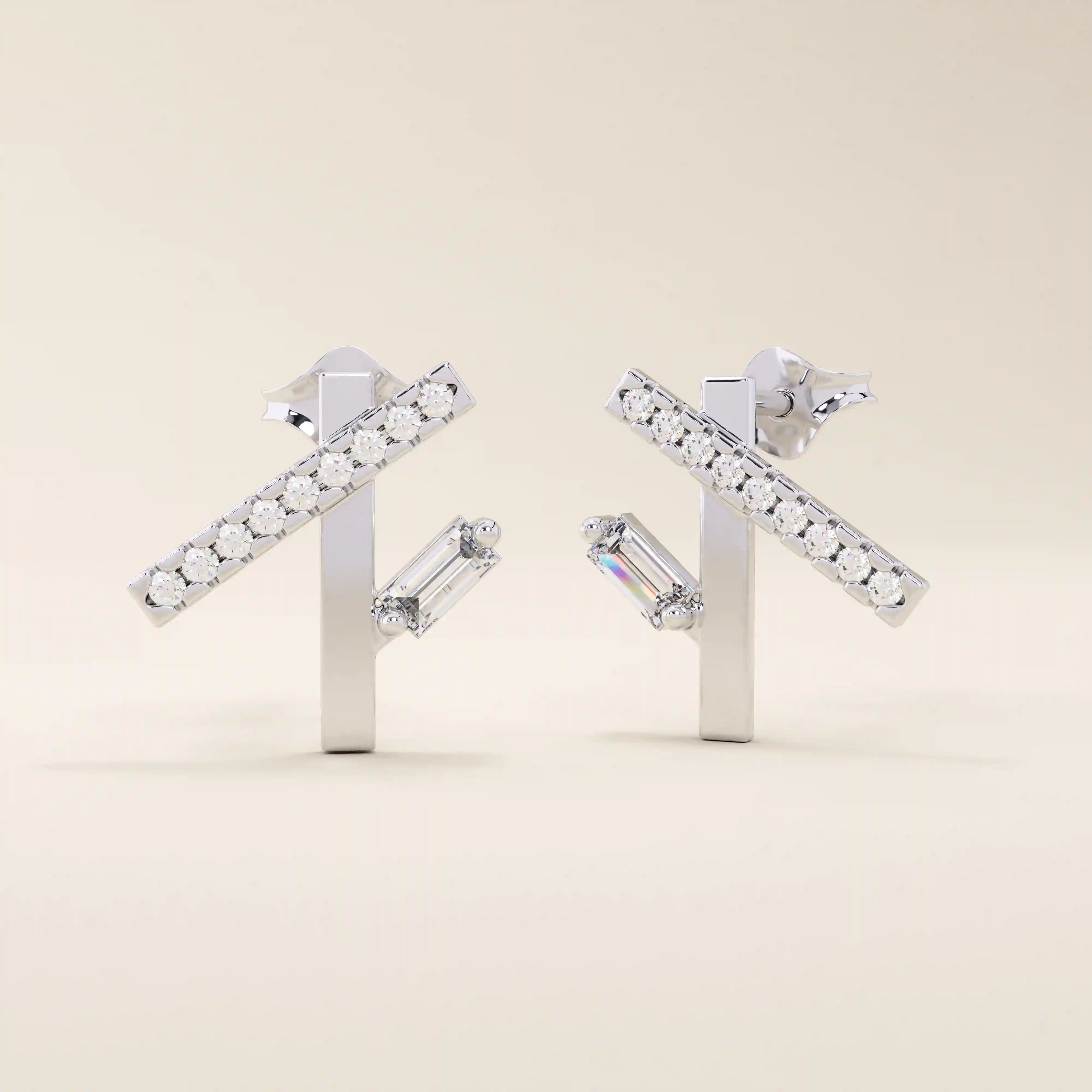 14k solid white gold geometric line stud earrings featuring pavé-set moissanite rounds on a bar with a vertical baguette stone below.