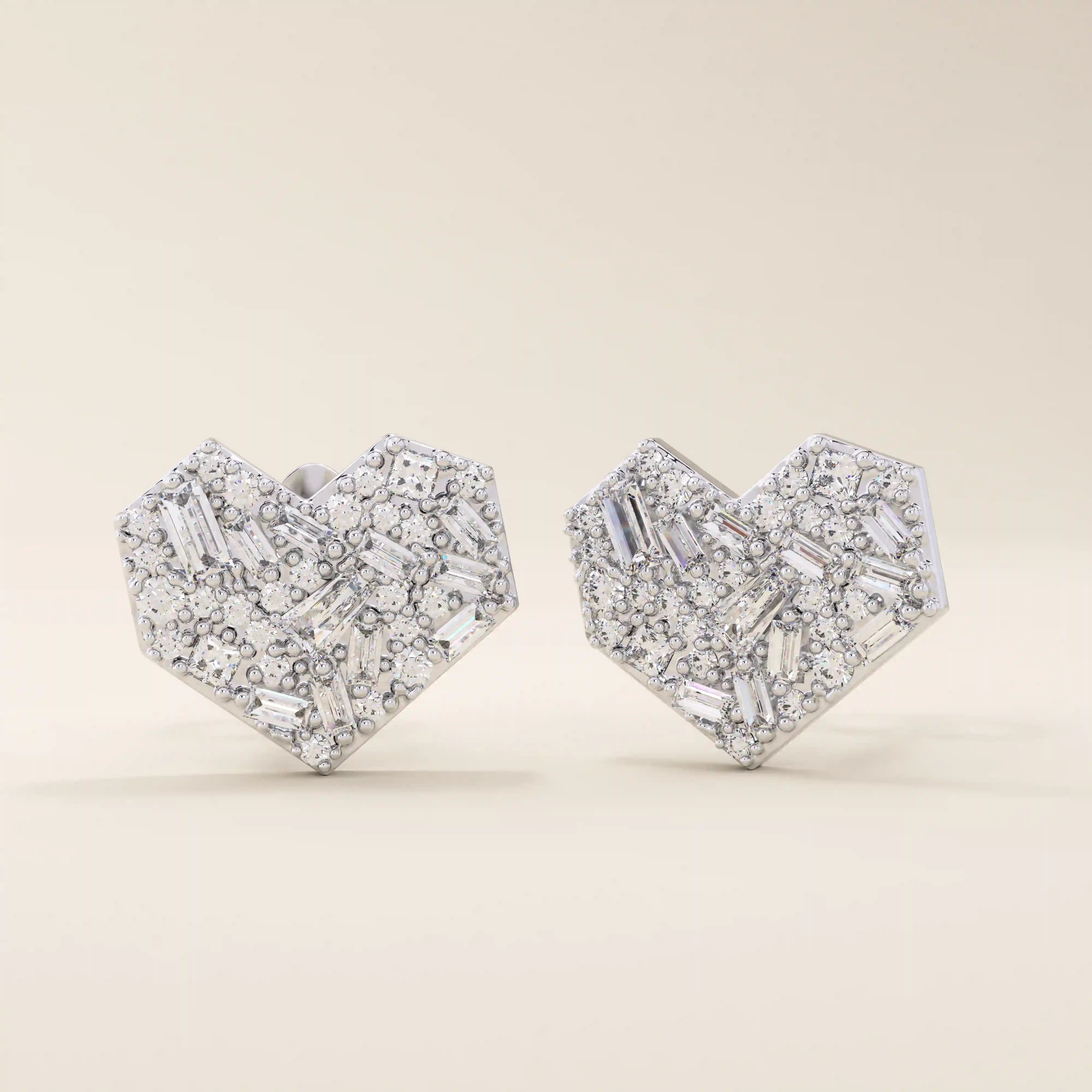 14k solid white gold heart stud earrings with a dazzling arrangement of baguette and round white moissanite stones, creating a brilliant, multi-faceted surface.