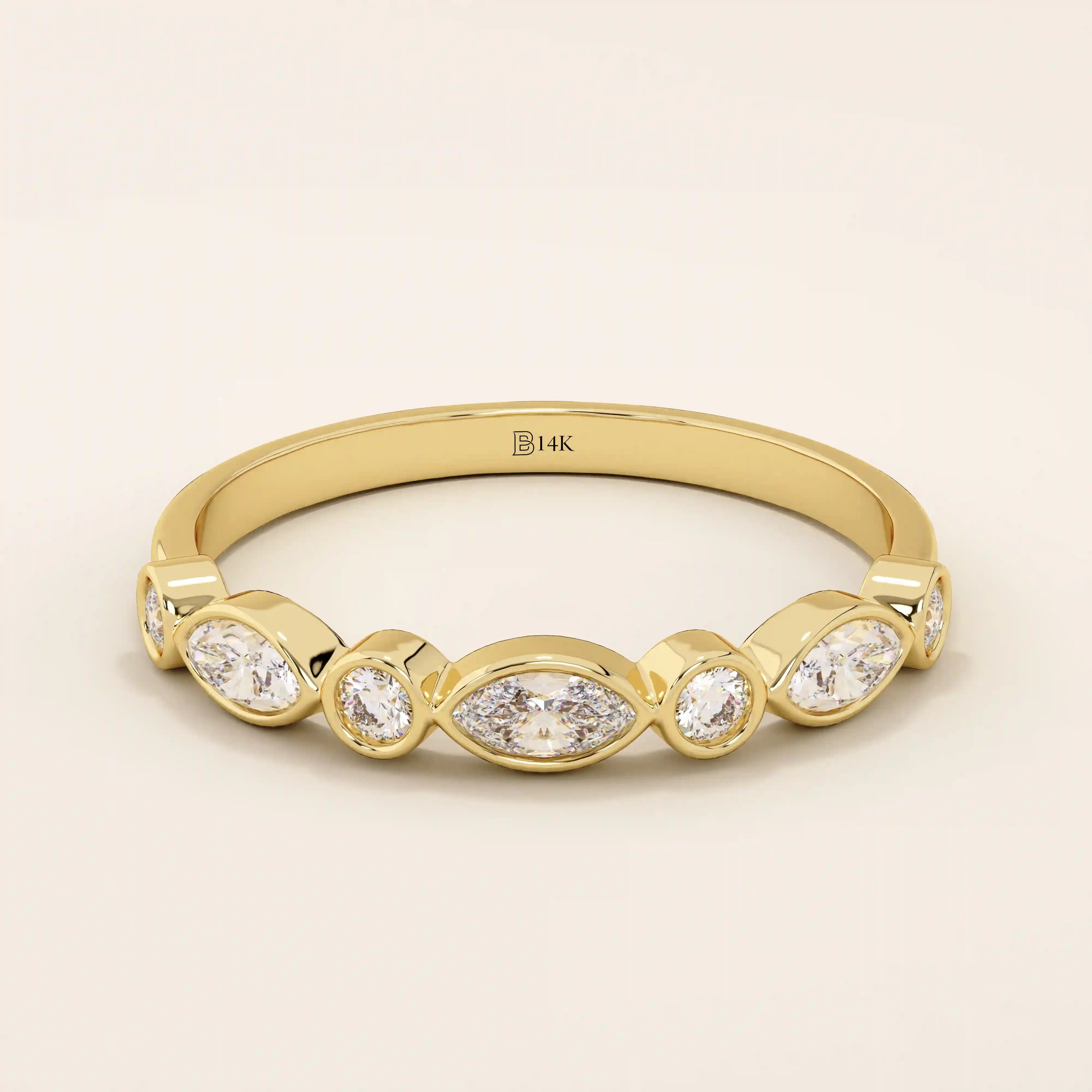 14k solid yellow gold band featuring alternating marquise cut and round brilliant cut moissanite stones in a smooth bezel setting, elegant fine jewelry for weddings or special occasions