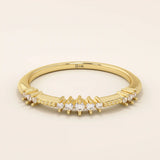 14k solid yellow gold band featuring round brilliant cut moissanite stones in alternating prong and bead settings, delicate fine jewelry ring for weddings or stacking