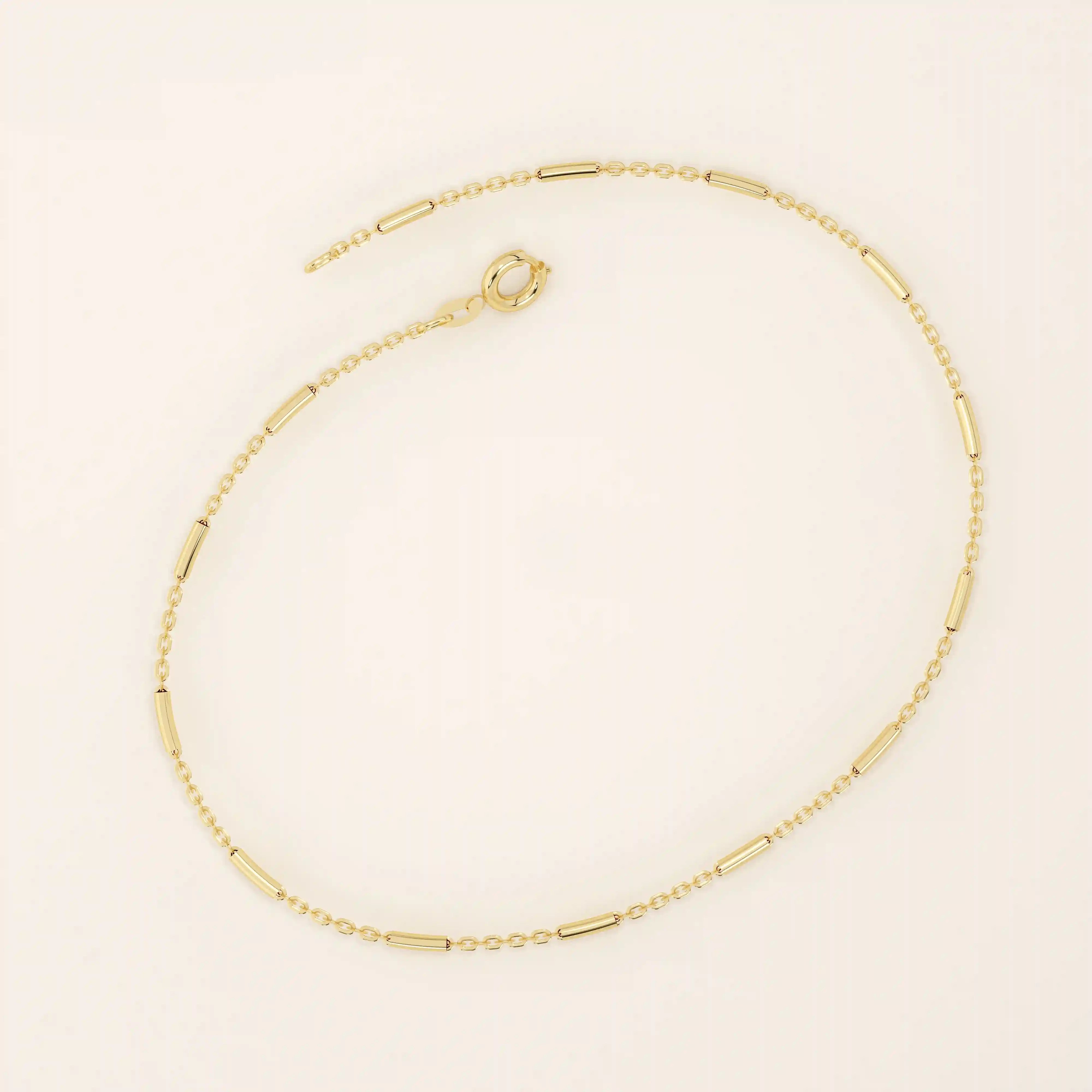 14k solid yellow gold bar chain bracelet featuring sleek horizontal bar links evenly spaced along a delicate gold chain, offering a modern and minimal aesthetic.