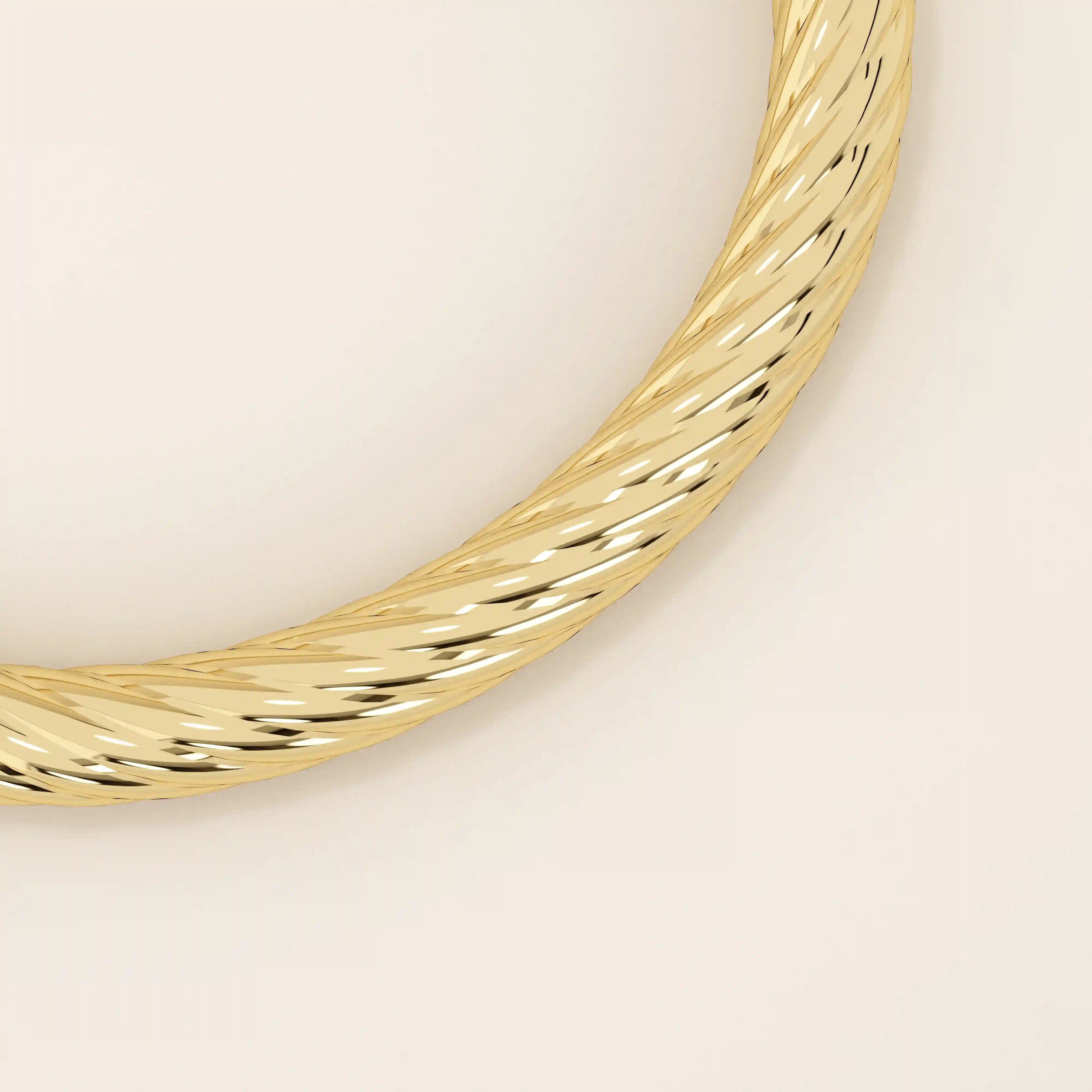 14k solid yellow gold rope bangle bracelet featuring a twisted rope texture, polished finish, and rounded edges.