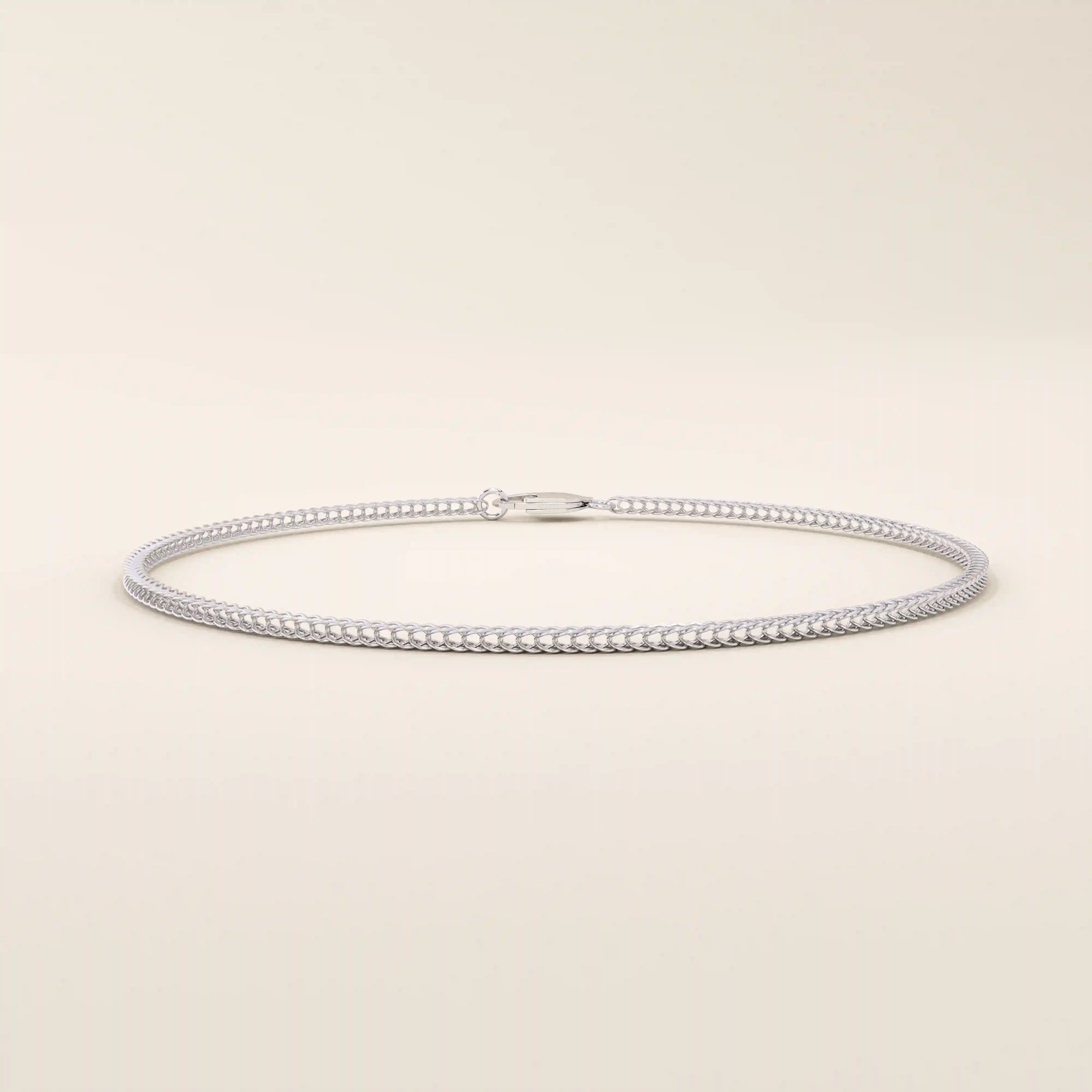 14k white gold bracelet featuring a fine wheat chain with intricate interwoven links.