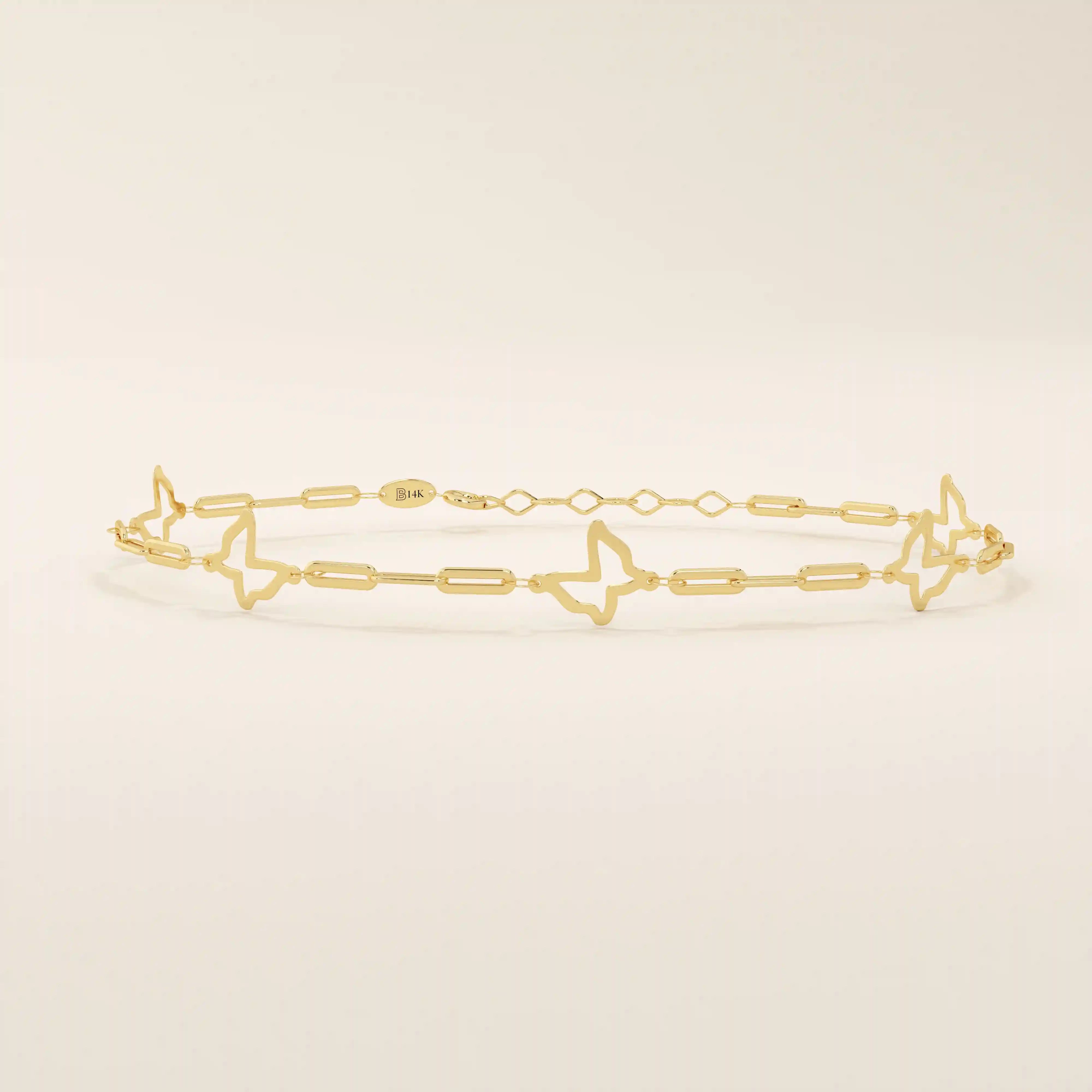 14k yellow gold bracelet featuring open butterfly charms linked with elongated chain links for a delicate look.