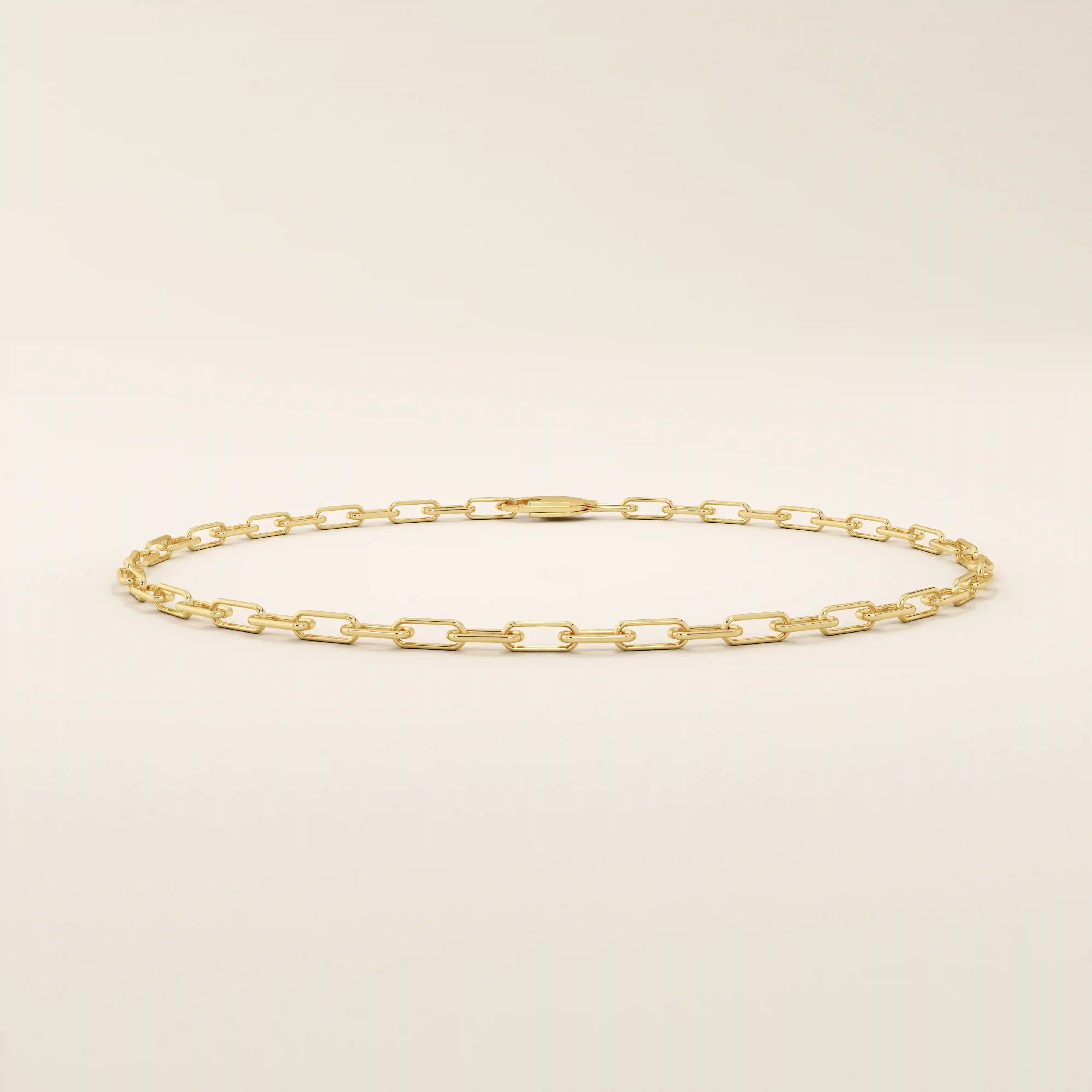 14k yellow gold bracelet with slim elongated links forming a modern link chain design.