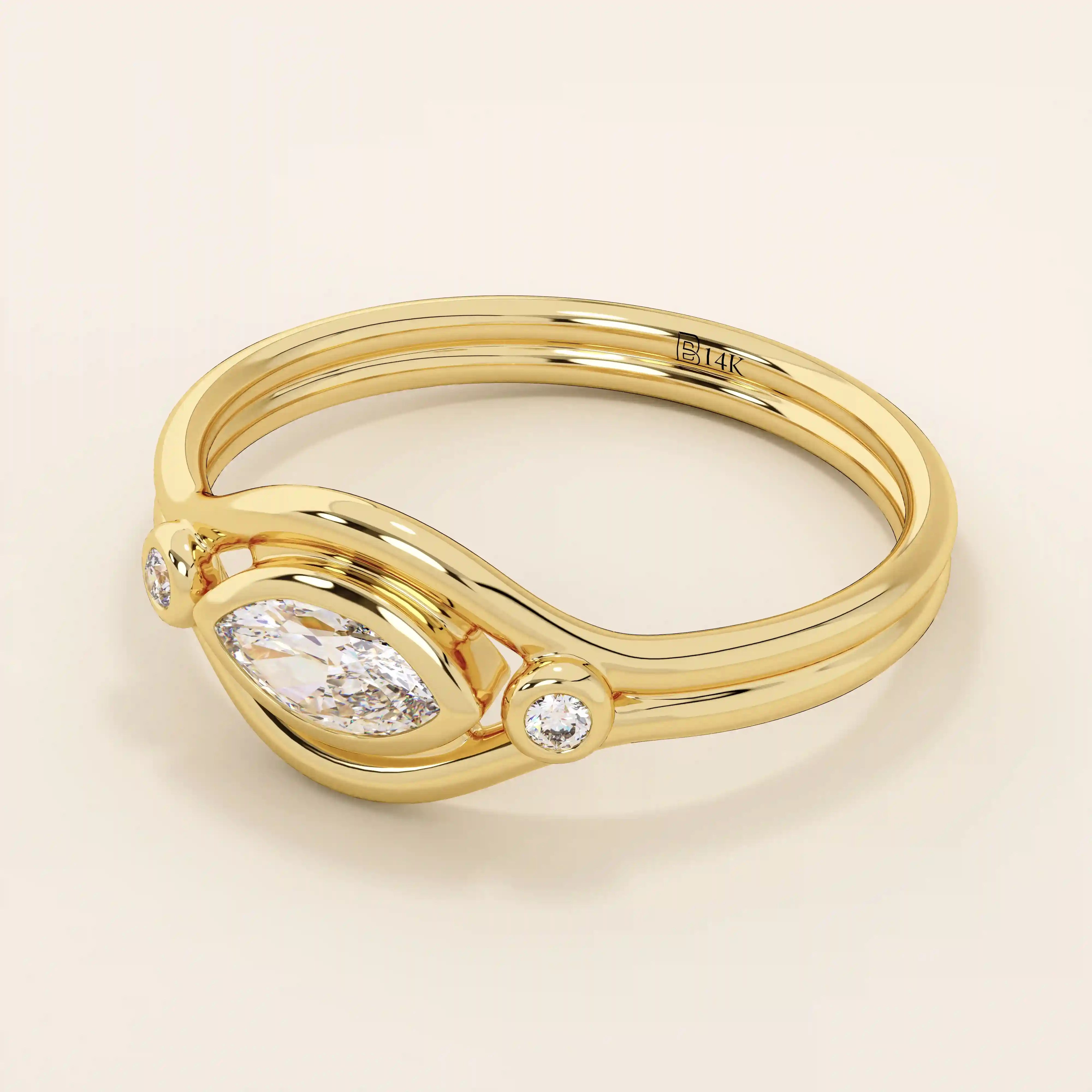 14k solid gold pinky signet ring featuring a bezel-set marquise moissanite in an evil eye design. A protective and stylish symbol in a minimalist ring.