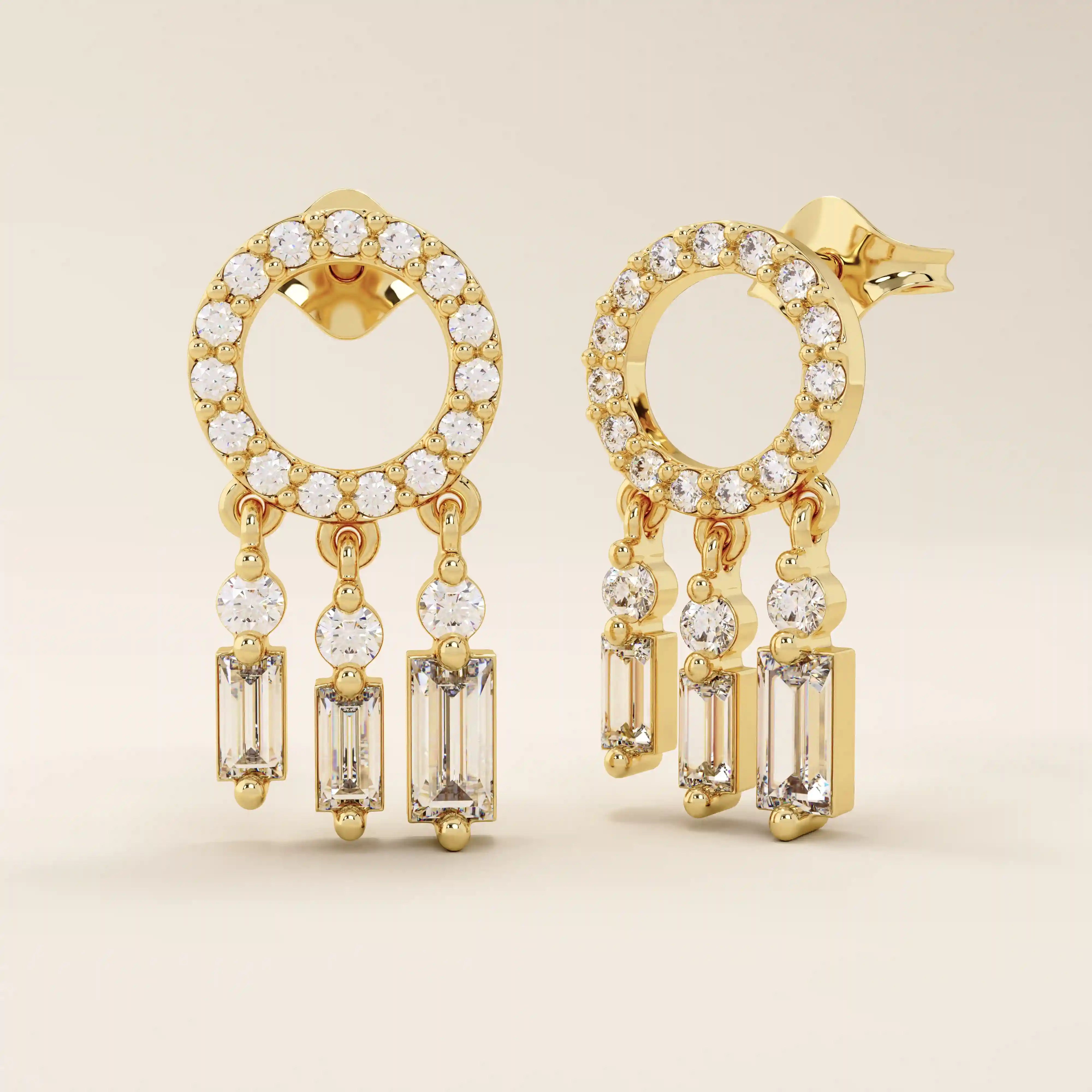 Angled view of 14k yellow gold pavé circle stud earrings with three moissanite drop dangles in mixed shapes.