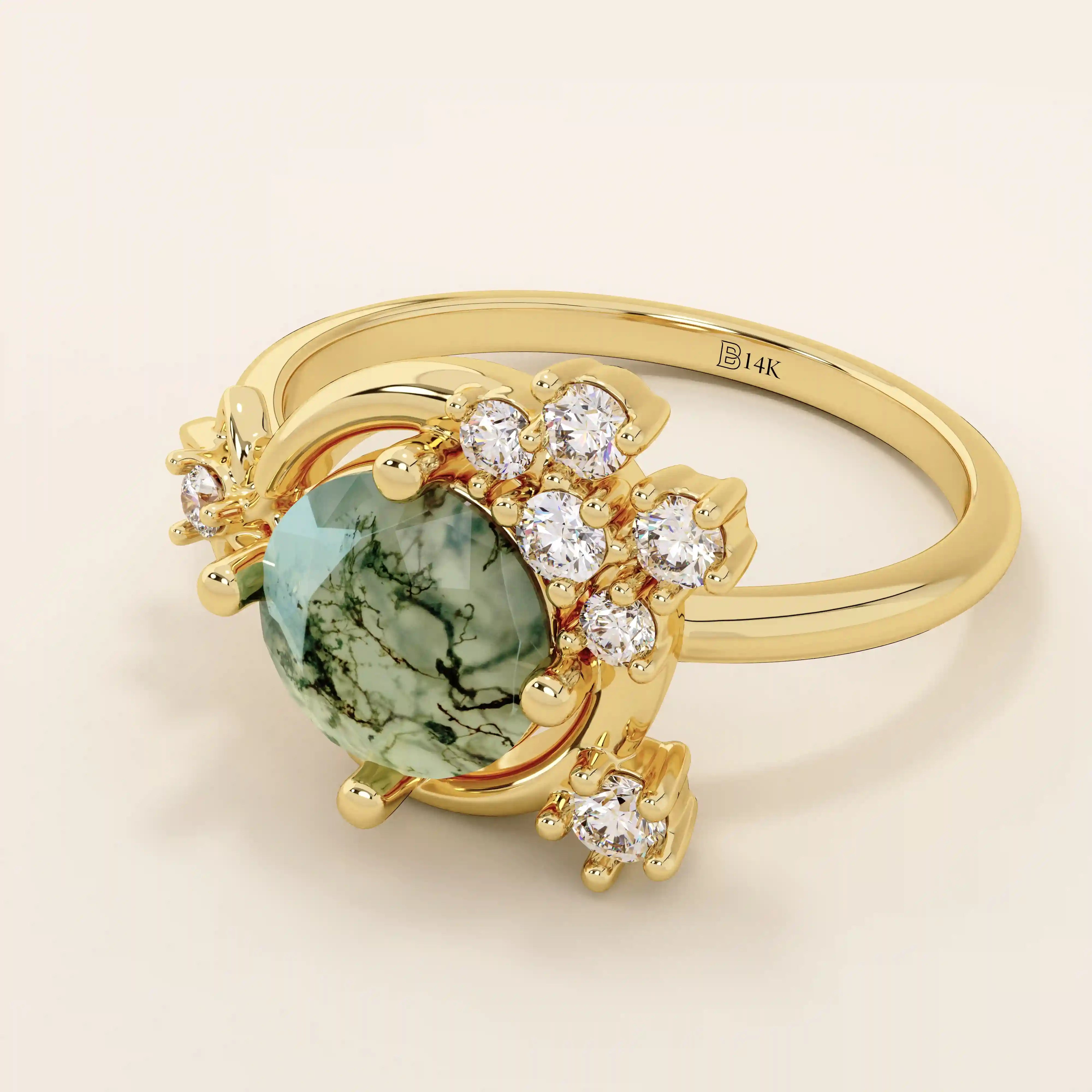 Chunky 14k gold ring with moss agate stone and celestial moon detail. Unique gemstone ring with natural patterns. Ideal for earthy and bold styles.