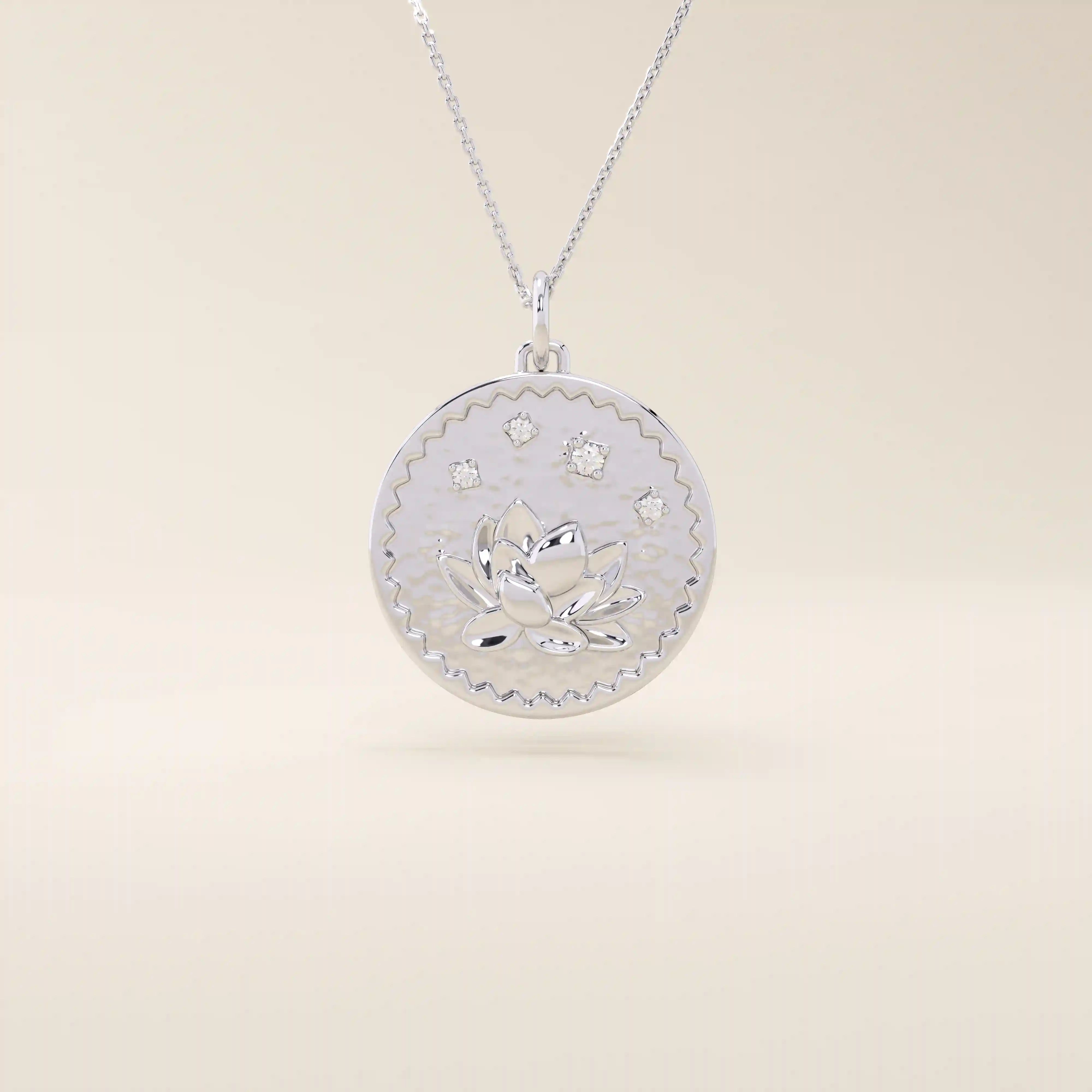 Close-up of a 14k solid white gold pendant necklace featuring an embossed water lily and a tiny moissanite. Dainty nature-inspired jewelry for women. Ideal as a minimalist everyday gold necklace.