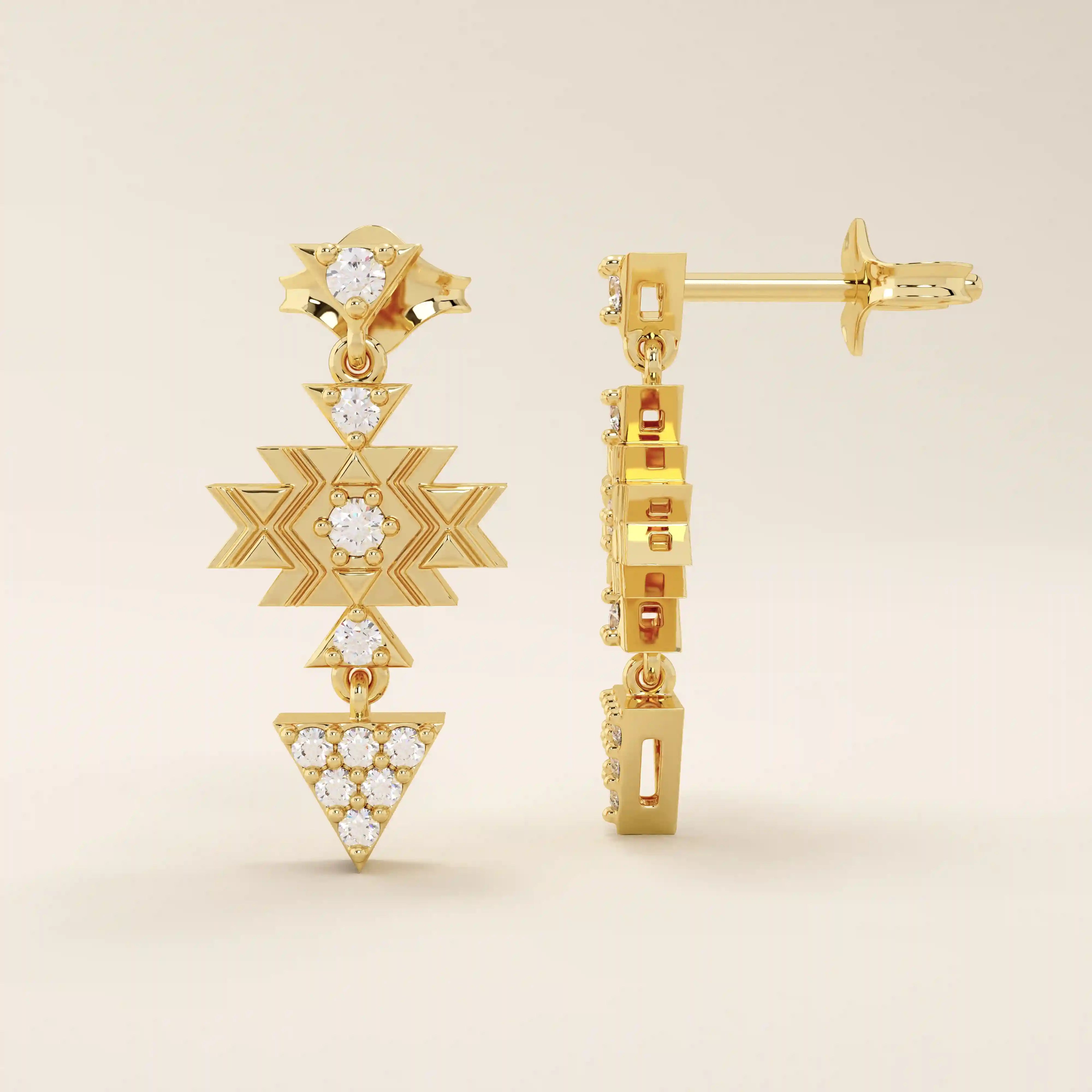 Close-up of dangling motif stud earrings in 14k gold with moissanite set in geometric star and triangle shapes.