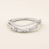 Curved beaded ring in 14k solid gold, featuring marquise and round moissanites. A unique nesting design perfect for stacking with solitaires.