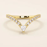 Curved stacking ring in 14k solid gold with a triangle moissanite at the peak and pavé moissanite accents. A modern, geometric nesting design.