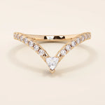 Curved stacking ring in 14k solid gold with a triangle moissanite at the peak and pavé moissanite accents. A modern, geometric nesting design.