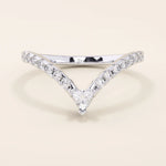 Curved stacking ring in 14k solid gold with a triangle moissanite at the peak and pavé moissanite accents. A modern, geometric nesting design.