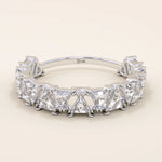 White gold ring with triangle moissanite accents