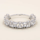 White gold ring with triangle moissanite accents