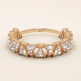 Gold wedding ring with triangle moissanite accents