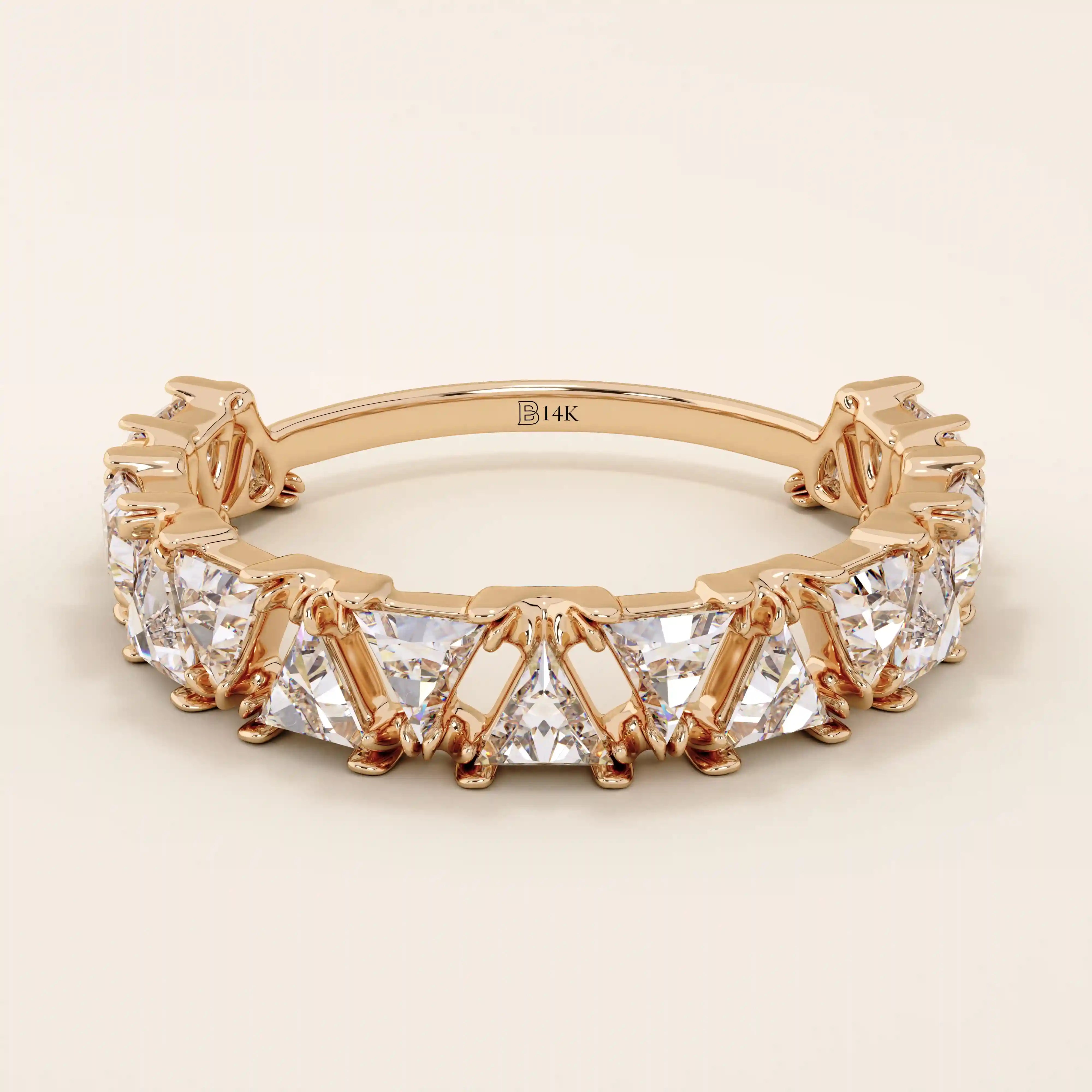 Gold wedding ring with triangle moissanite accents