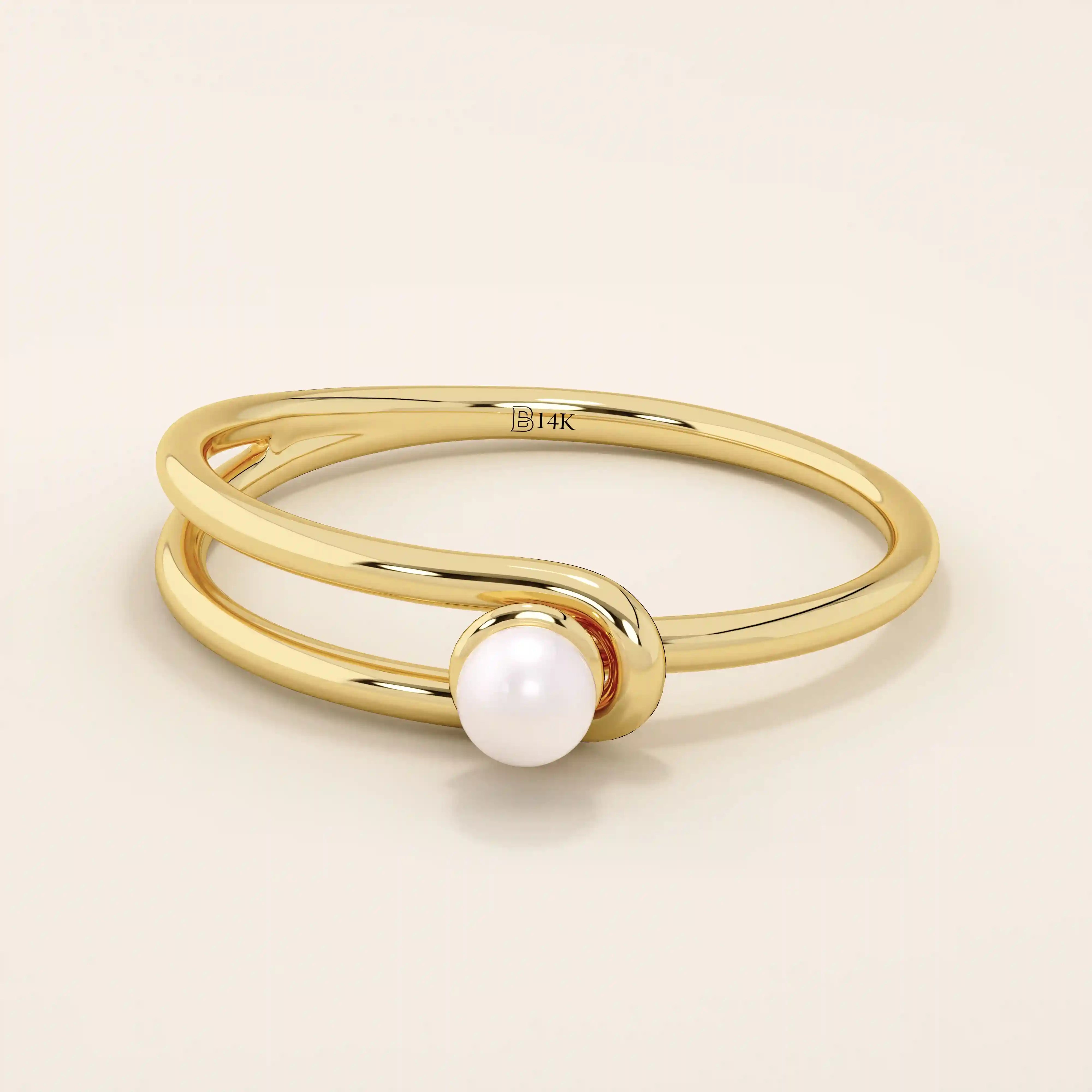 Minimalist 14k solid gold split band promise ring featuring a single lustrous pearl. Elegant design perfect for everyday wear or special occasions.