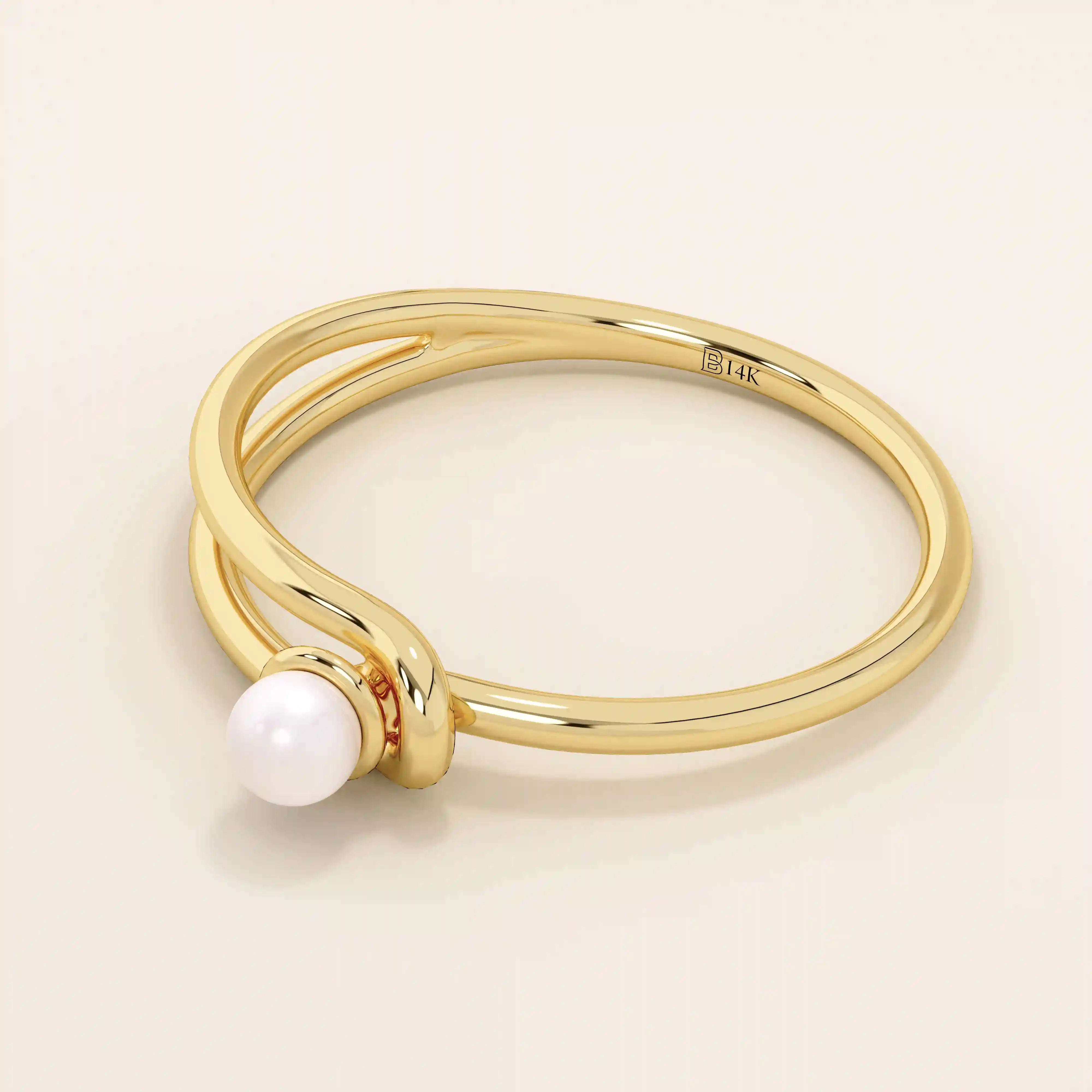 Minimalist 14k solid gold split band promise ring featuring a single lustrous pearl. Elegant design perfect for everyday wear or special occasions.