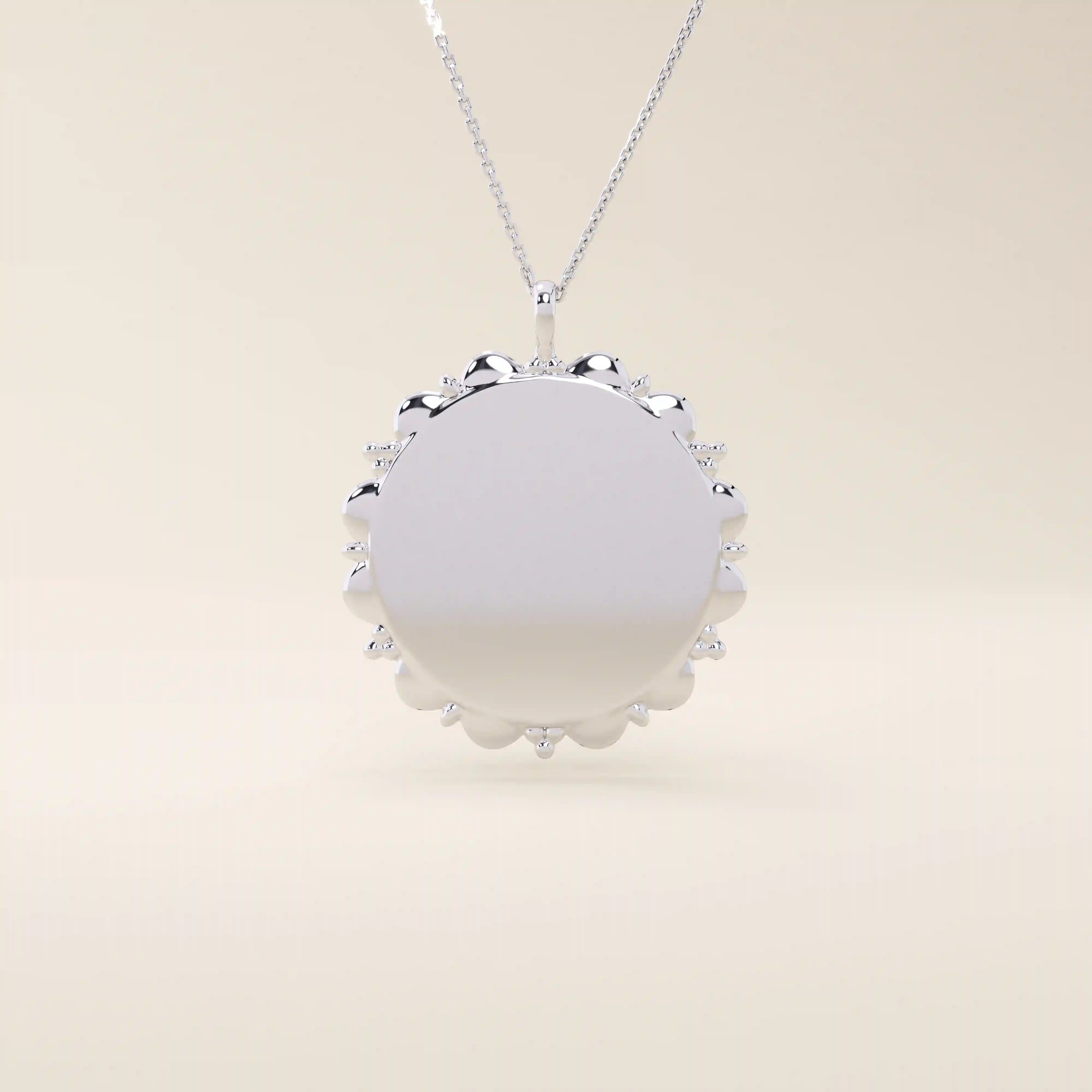 Minimalist sun-shaped necklace in 14k solid gold with a smooth, engravable surface. A timeless everyday piece perfect for personalization and gifting.