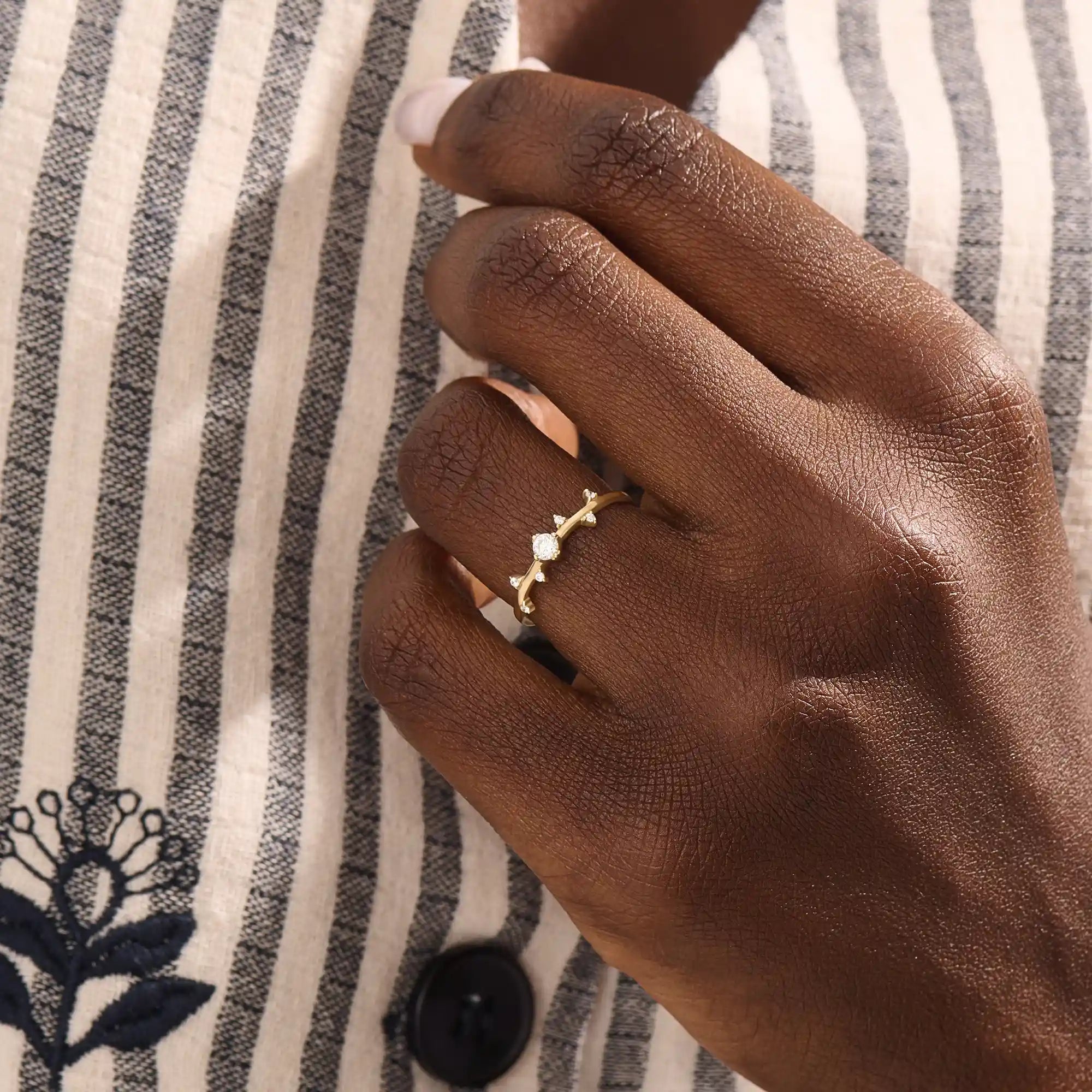 Model wearing a 14k solid gold minimalist solo promise ring, highlighting its simple yet elegant design for a modern, everyday look.