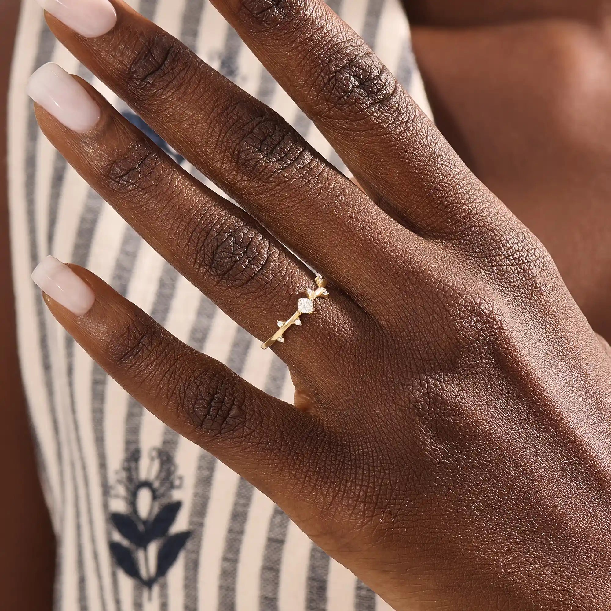 Model wearing a 14k solid gold minimalist solo promise ring, highlighting its simple yet elegant design for a modern, everyday look.