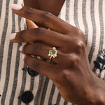 Model wearing a bold moss agate gold ring with celestial moon design. Nature-inspired statement ring with organic charm in solid gold.