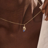 Model wears a 14k solid gold Virgo zodiac pendant necklace with sapphire, perfect Virgo zodiac birthday jewelry gift.
