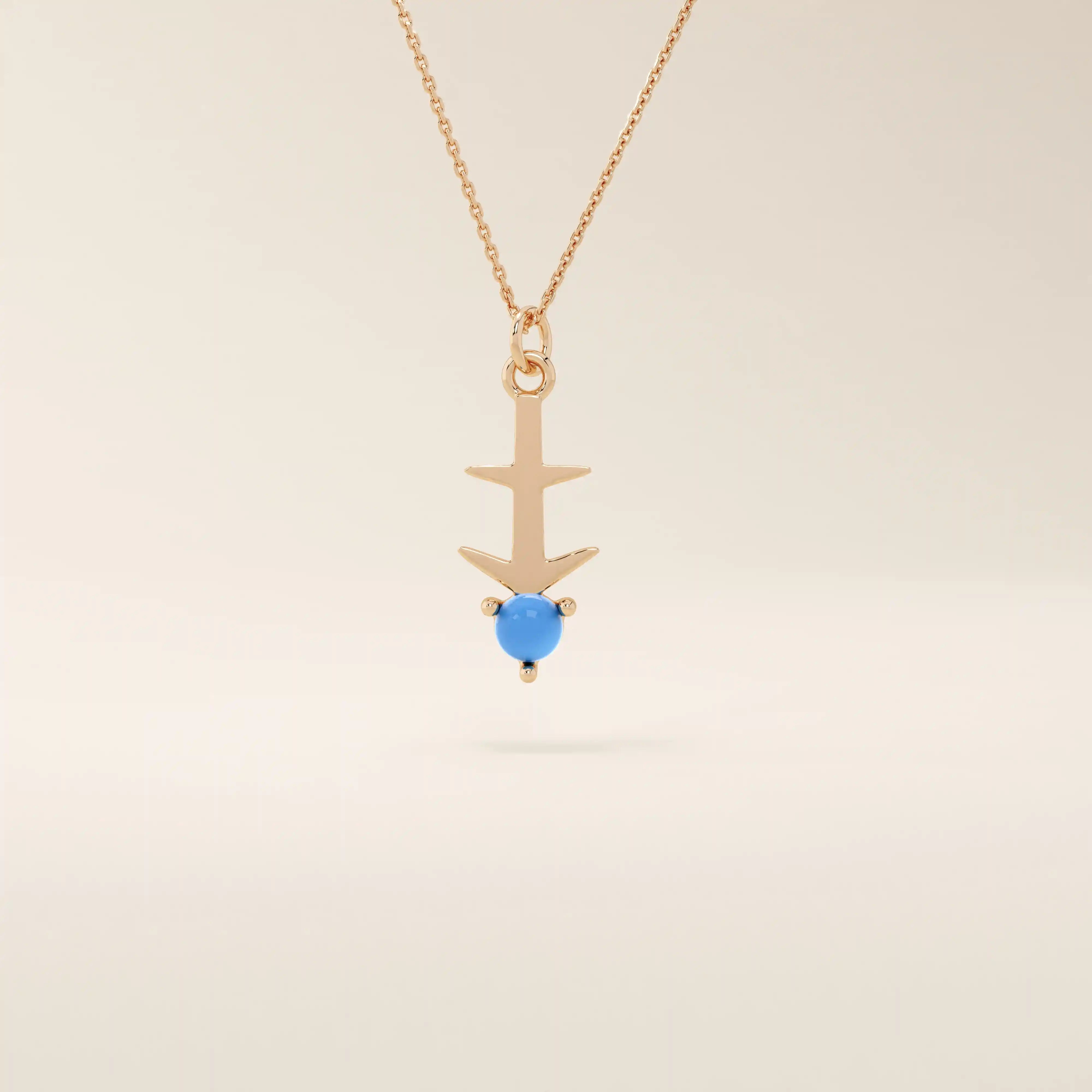 Sagittarius zodiac symbol pendant necklace in 14k solid gold with turquoise gemstone.
