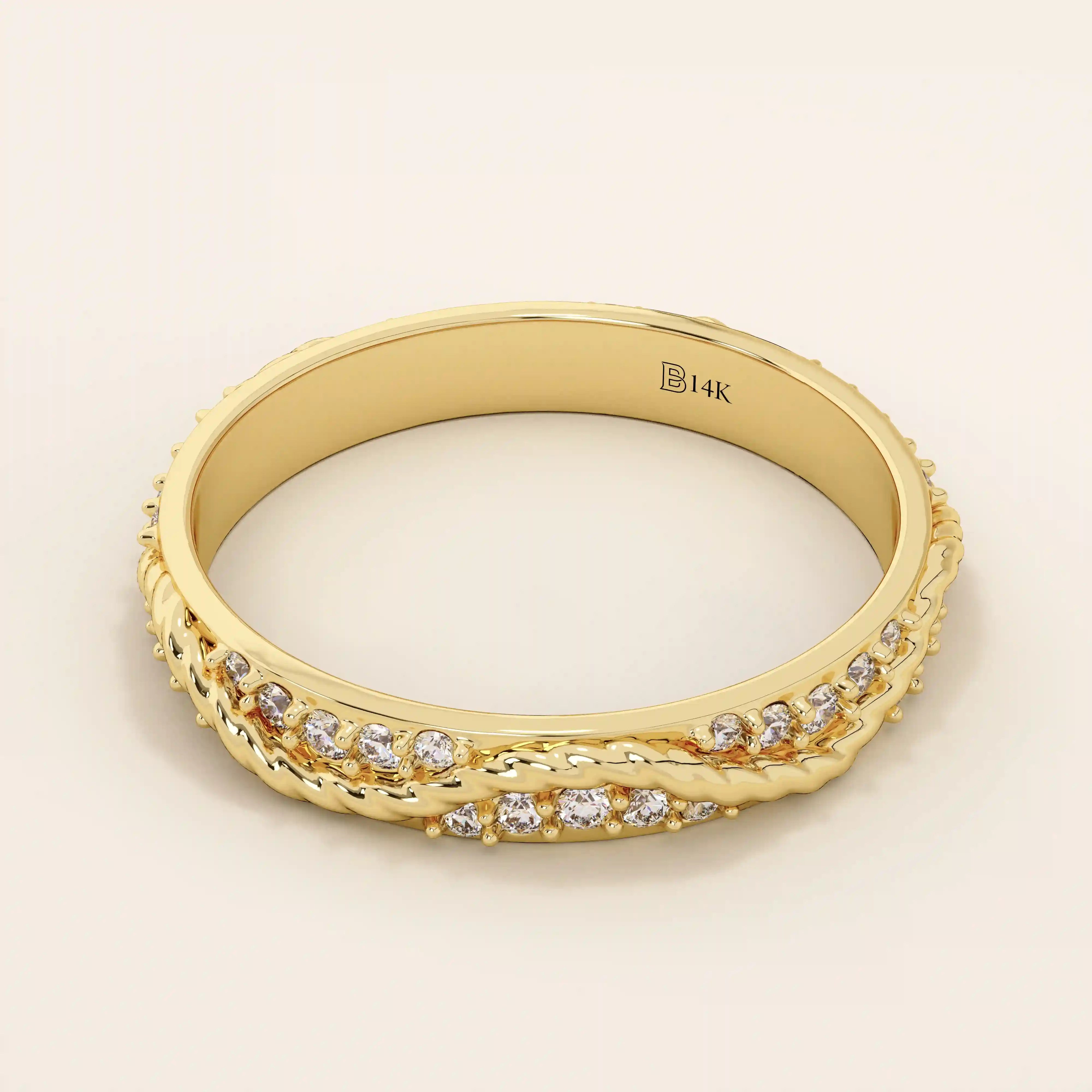 Side angle view of a 14k solid yellow gold twisted eternity wedding band with moissanites set in an interwoven design