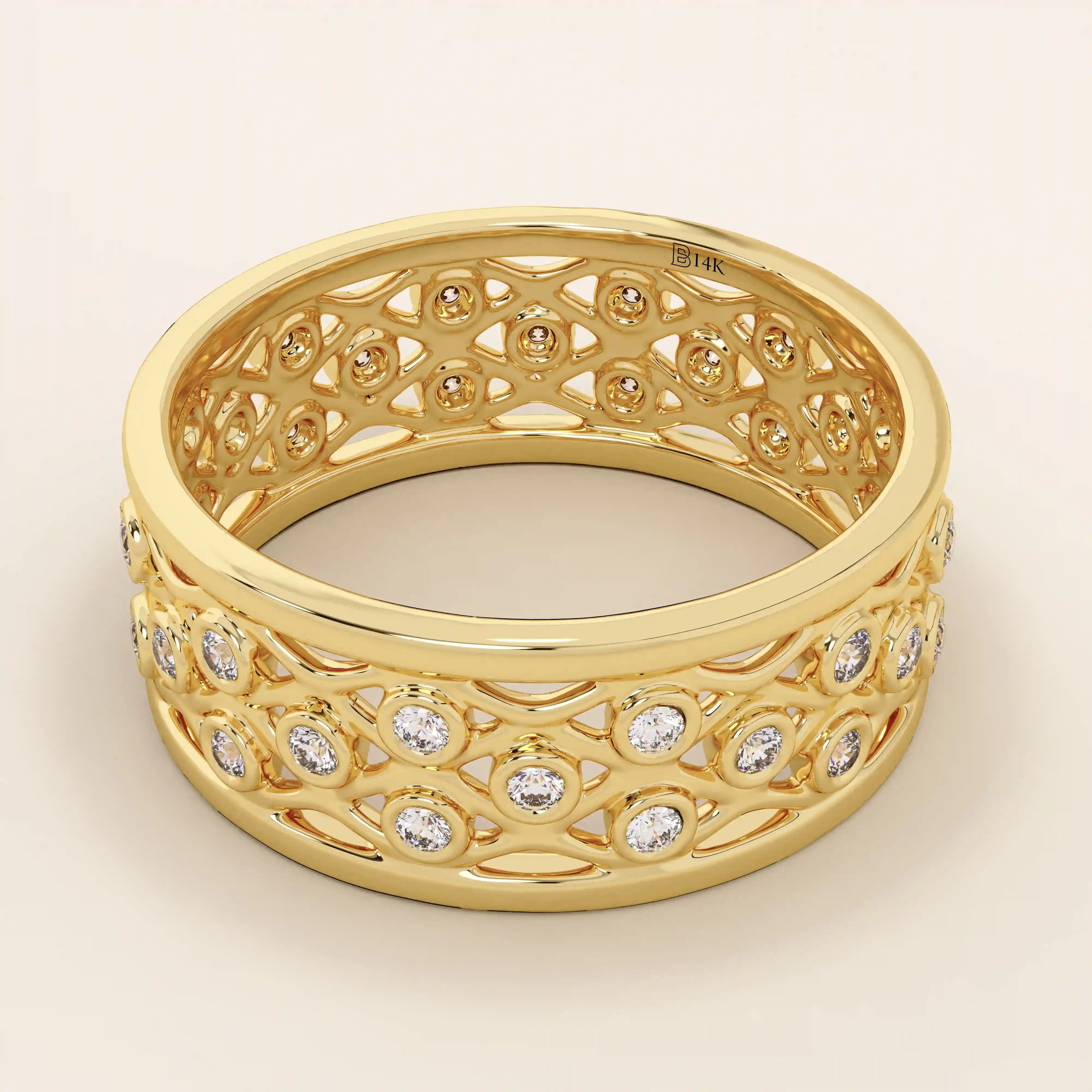 Side angle view of a 14k solid yellow gold wedding band with a detailed open lattice design and bezel-set moissanite stones