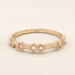 Slim 14k solid gold stacking ring with tiny flower motifs, minimalist and feminine jewelry design for everyday wear.