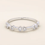 Slim 14k solid gold stacking ring with tiny flower motifs, minimalist and feminine jewelry design for everyday wear.