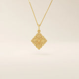 Unique 14k solid gold clover motif necklace featuring a smooth, plain pendant in a four-leaf design, symbolizing luck and elegance, perfect for everyday wear.