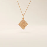 Unique 14k solid gold clover motif necklace featuring a smooth, plain pendant in a four-leaf design, symbolizing luck and elegance, perfect for everyday wear.