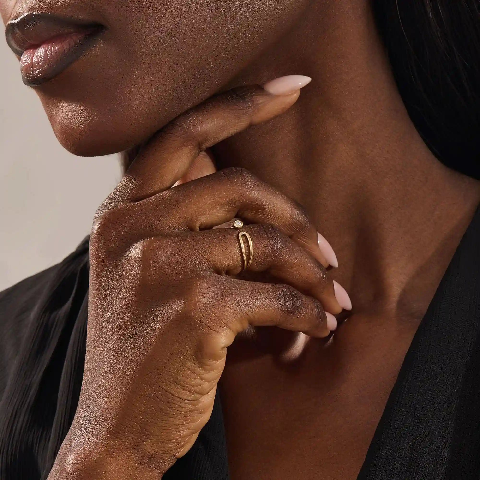 stackable statement ring features a bezel-set solitaire round stone in a 14K solid yellow gold band FOR WOMEN