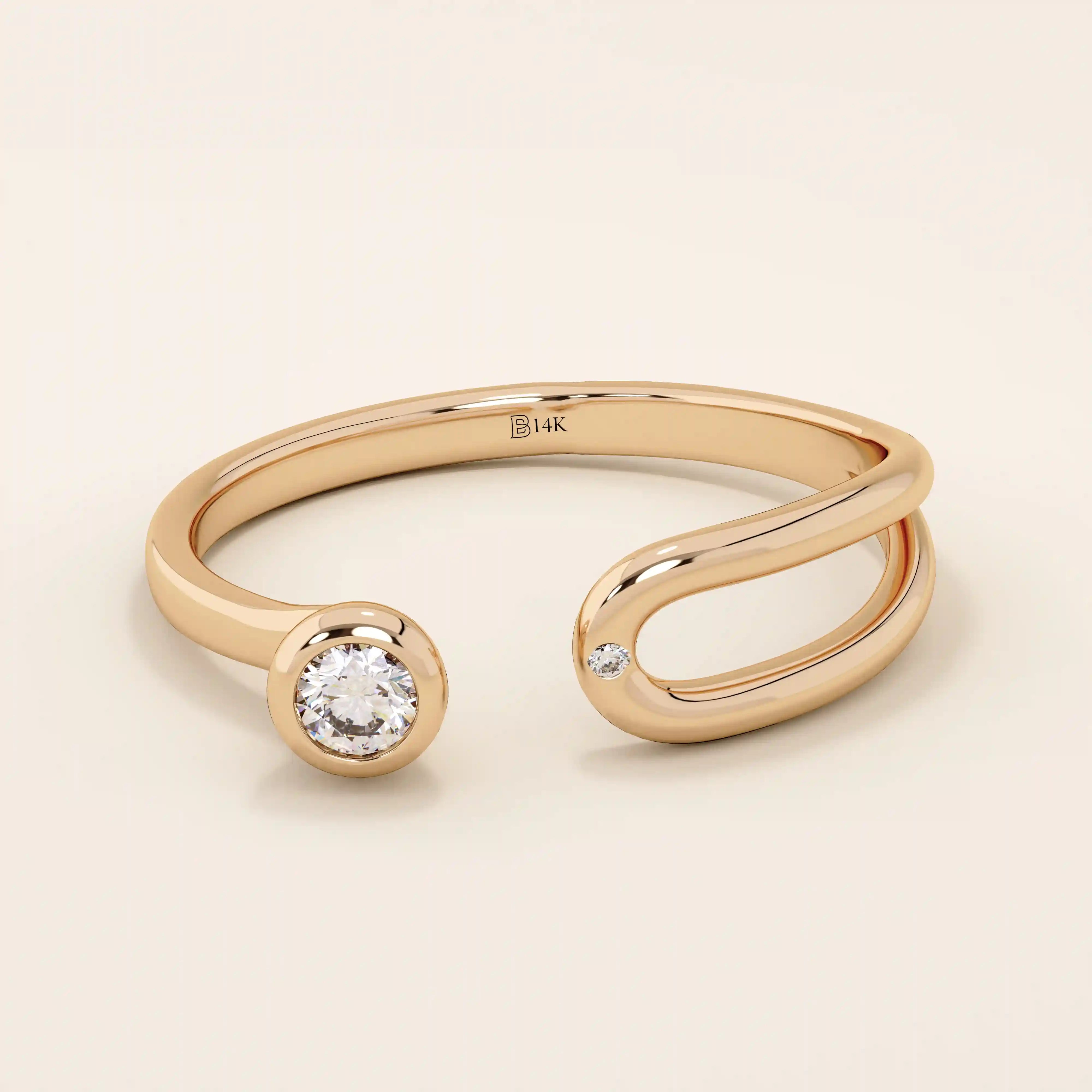 stackable statement ring features a bezel-set solitaire round stone in a 14K solid yellow gold band FOR WOMEN