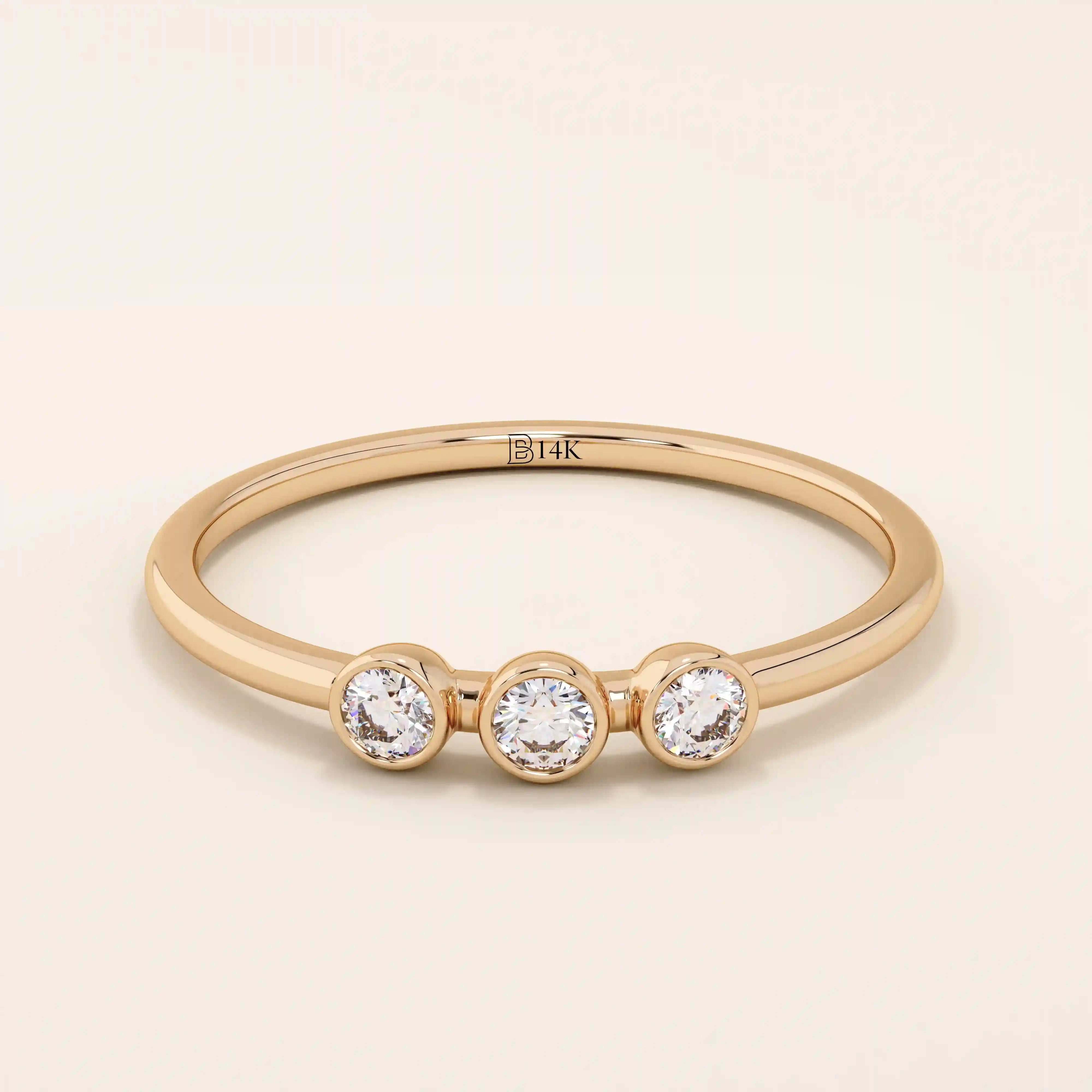 three bezel-set sparkling stones in brilliant 14k solid yellow gold slim band wedding stacking ring for women