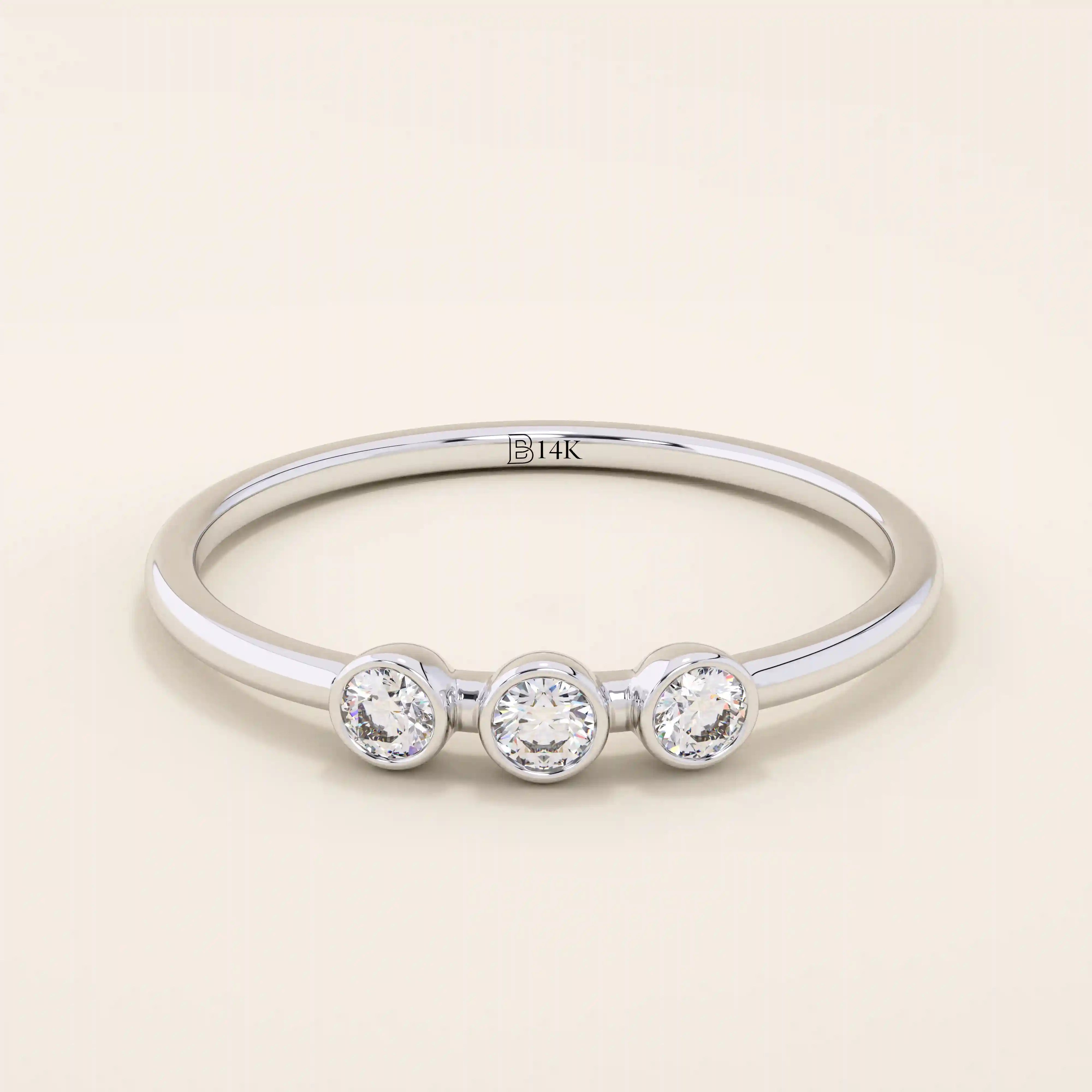 three bezel-set sparkling stones in brilliant 14k solid yellow gold slim band wedding stacking ring for women