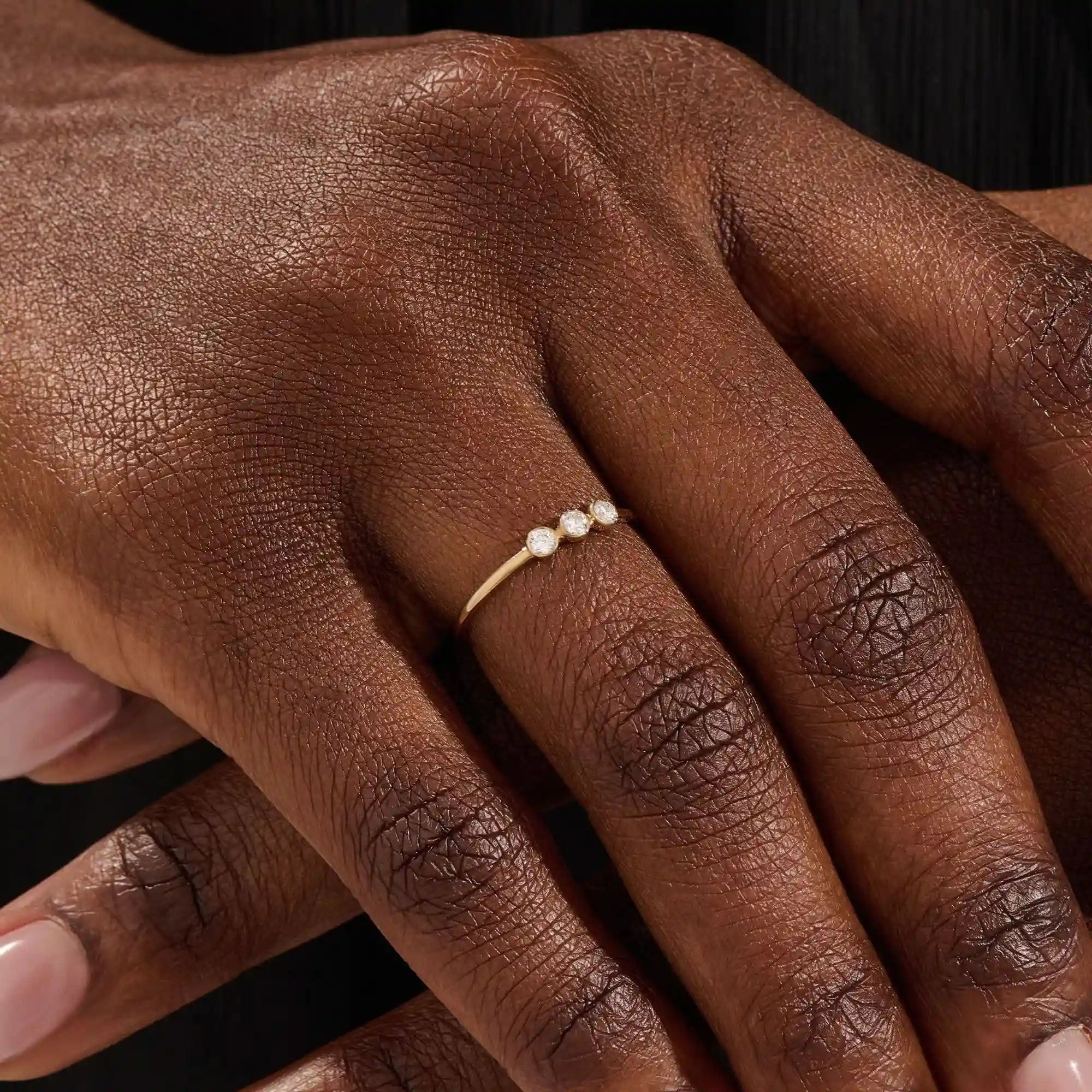 three bezel-set sparkling stones in brilliant 14k solid yellow gold slim band wedding stacking ring for women